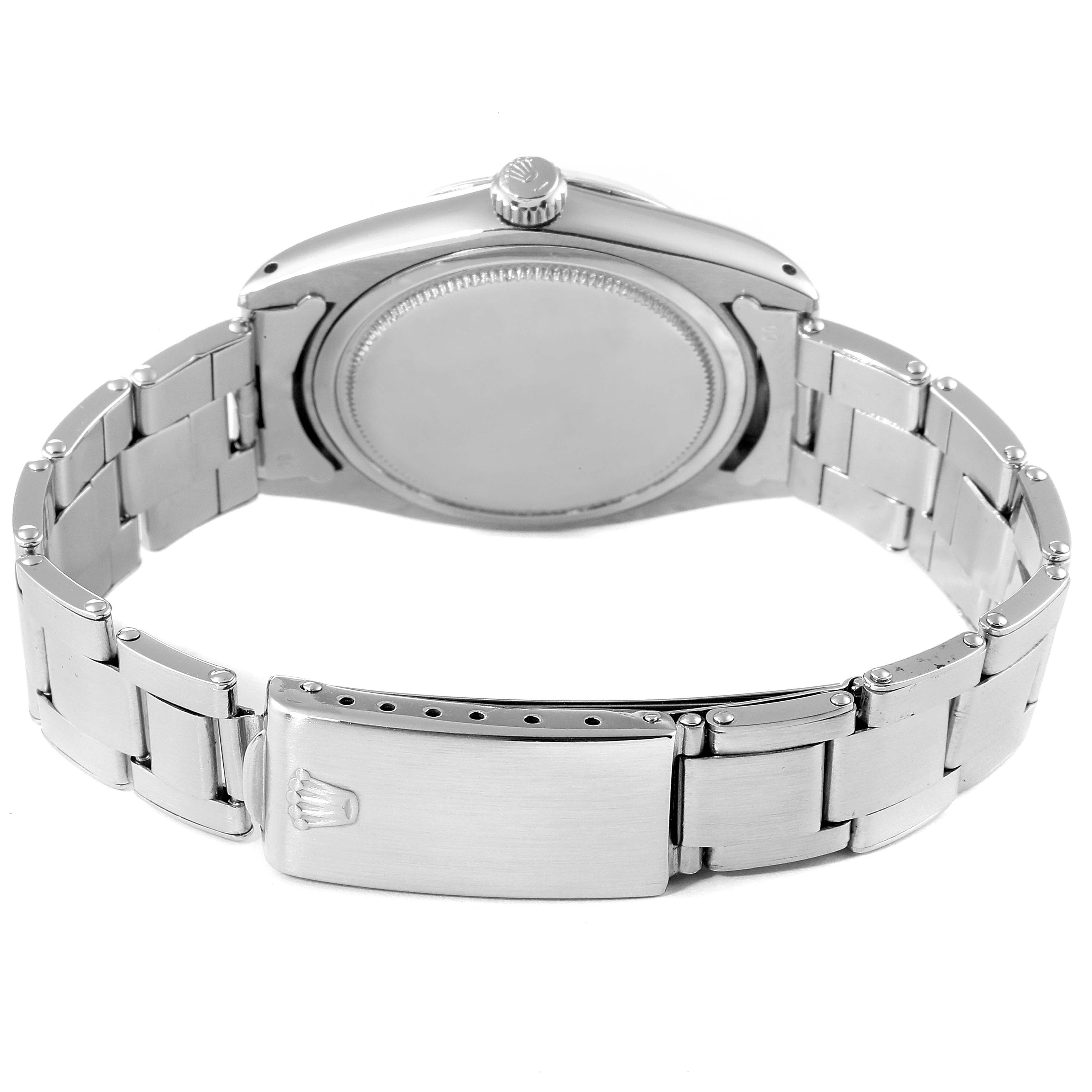 The image shows the back case and bracelet clasp of a Rolex Date 6694 Men's Stainless Steel Black Dial 6694 Men's Stainless Steel Black Dial model watch from a rear angle.