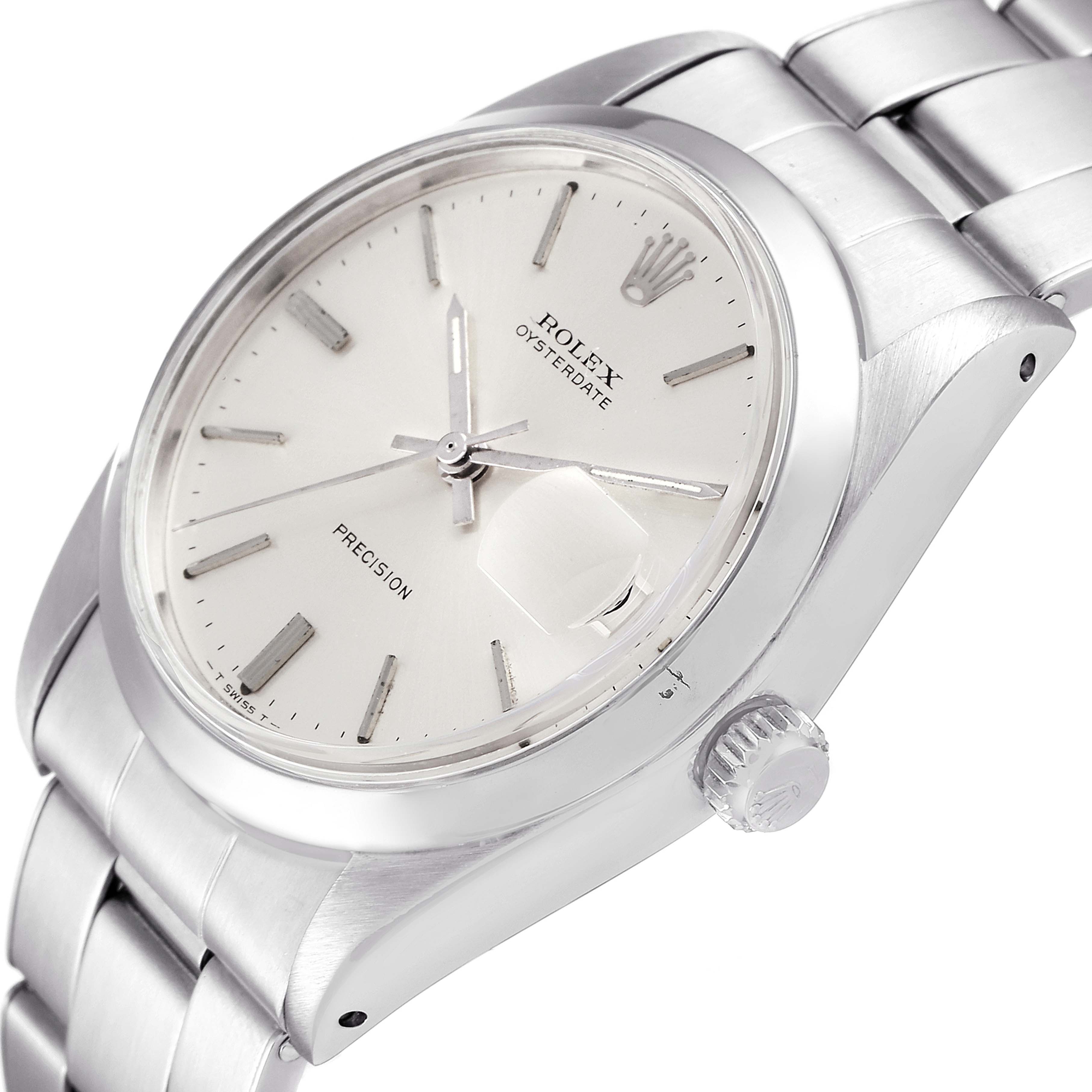 The image shows a close-up angled view of the Rolex Vintage Collection 6694 Men's Stainless Steel Silver Dial 6694 Men's Stainless Steel Silver Dial model watch, focusing on its dial, crown, and bracelet.