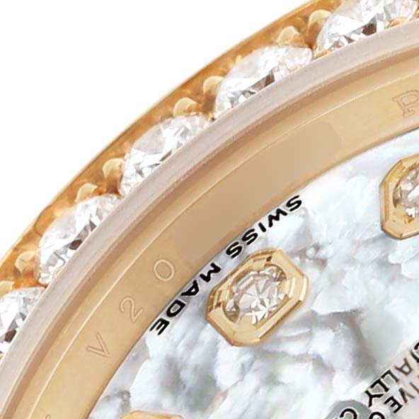 The image shows a close-up of the Rolex Pearlmaster 80298 Women's Yellow Gold Mother of Pearl Dial watch's bezel with diamonds and part of the dial with indices.