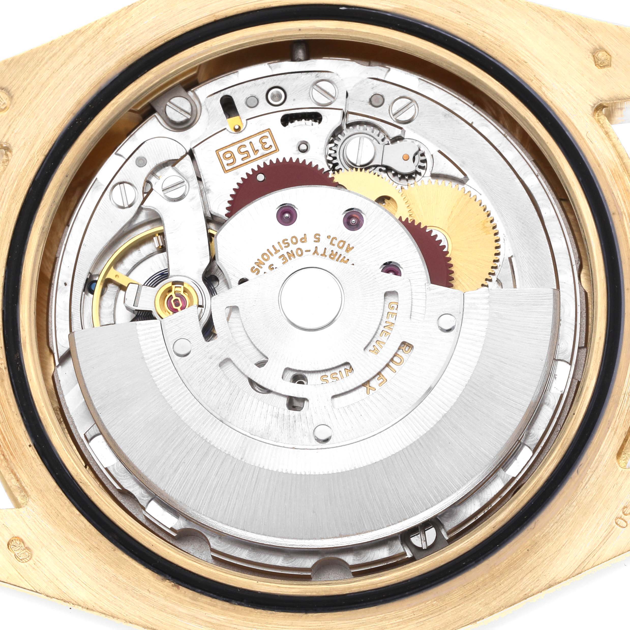 The image shows the internal movement of the Rolex President 218348 Men
s Yellow Gold Champagne Dial model from a back view, highlighting gears and the rotor.
