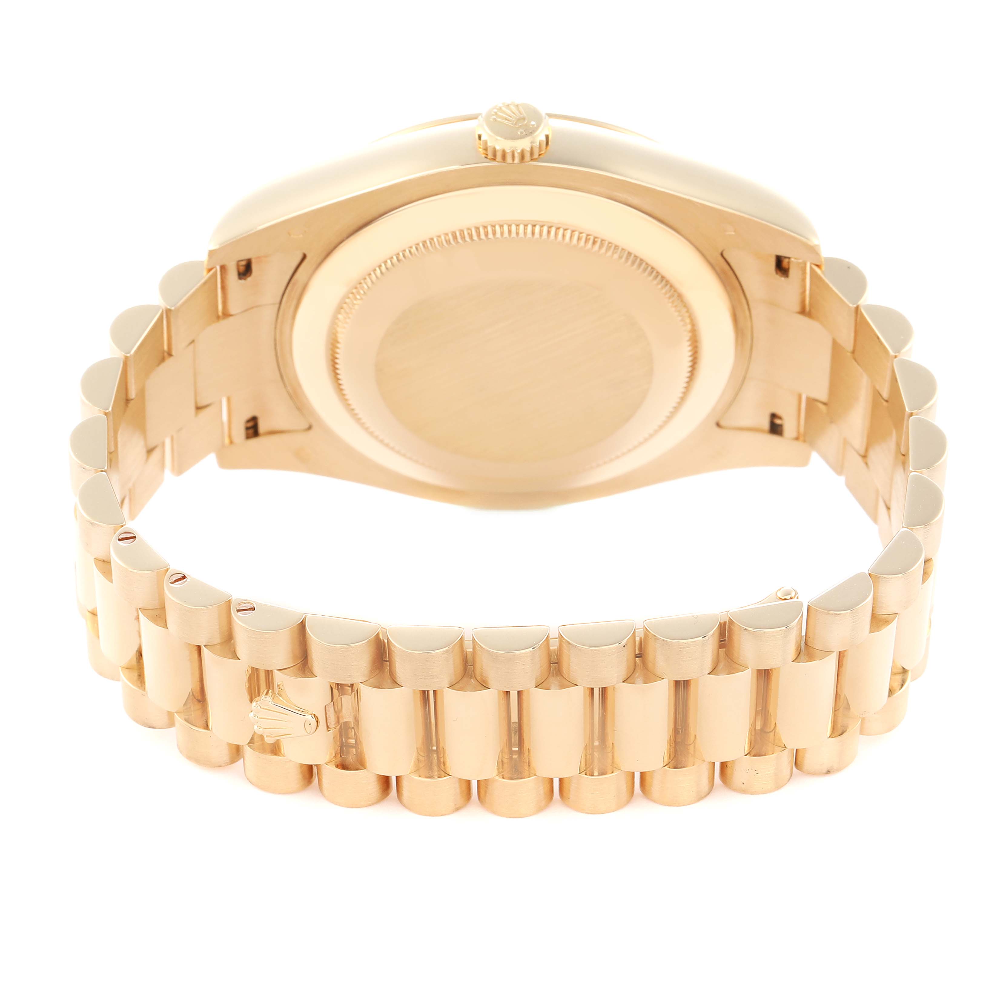 The image shows the back case and bracelet of a Rolex Daytona 218238 Men
s Yellow Gold Champagne Dial watch at an angled rear view.