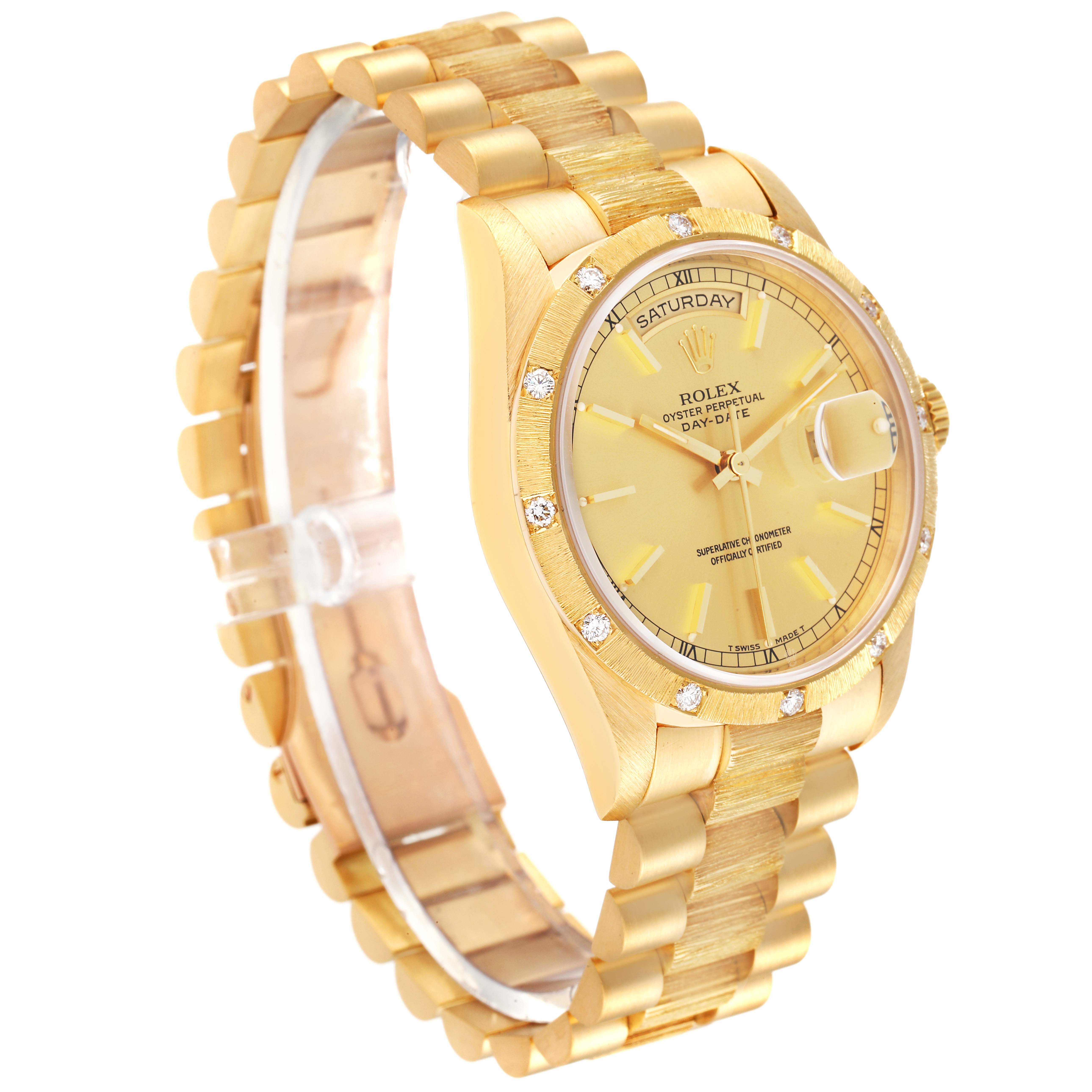 This image shows a gold Rolex President 18308 Men's Yellow Gold Champagne Dial 18308 Men's Yellow Gold Champagne Dial model watch angled to display its face, bezel with diamonds, and bracelet.