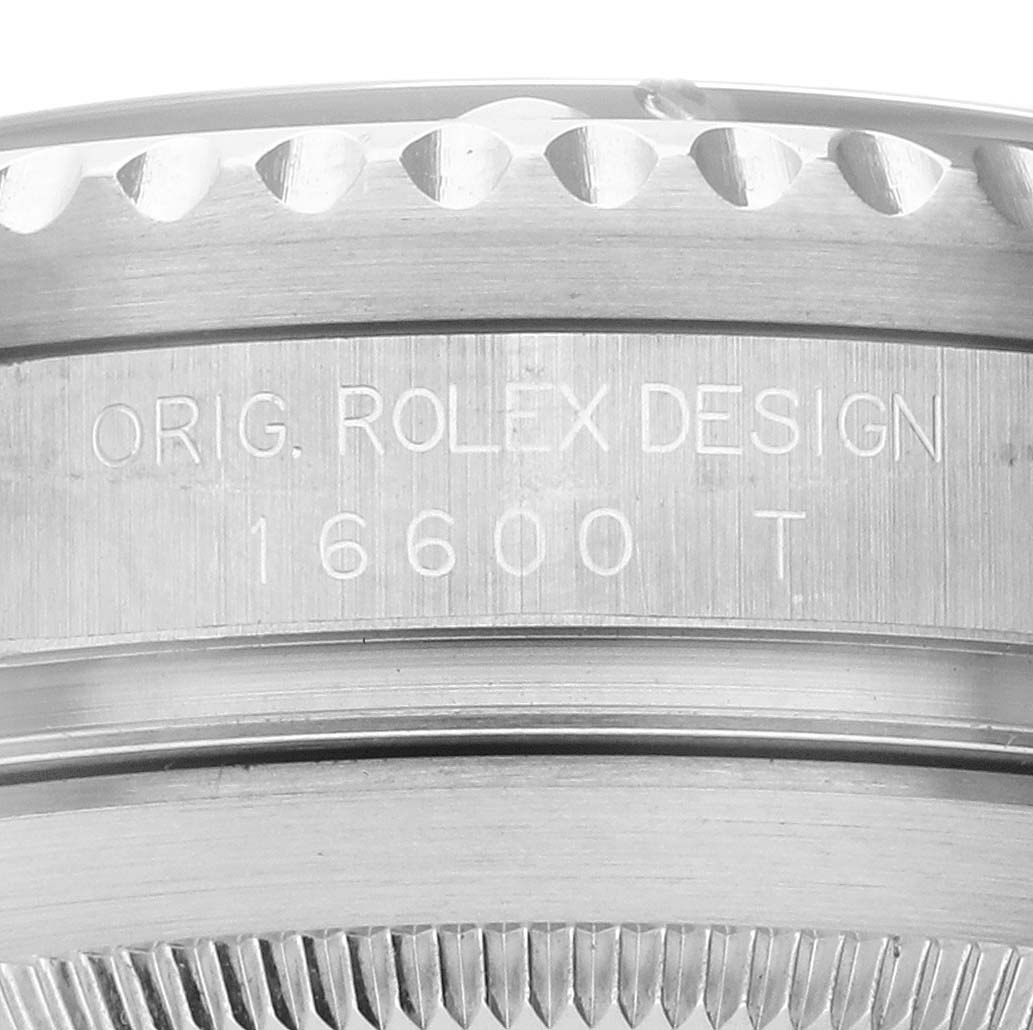 This image shows an angled close-up of the case side and bezel of a Rolex Sea-Dweller 16600 Men
s Stainless Steel Black Dial 16600 Men
s Stainless Steel Black Dial model 16600 T.