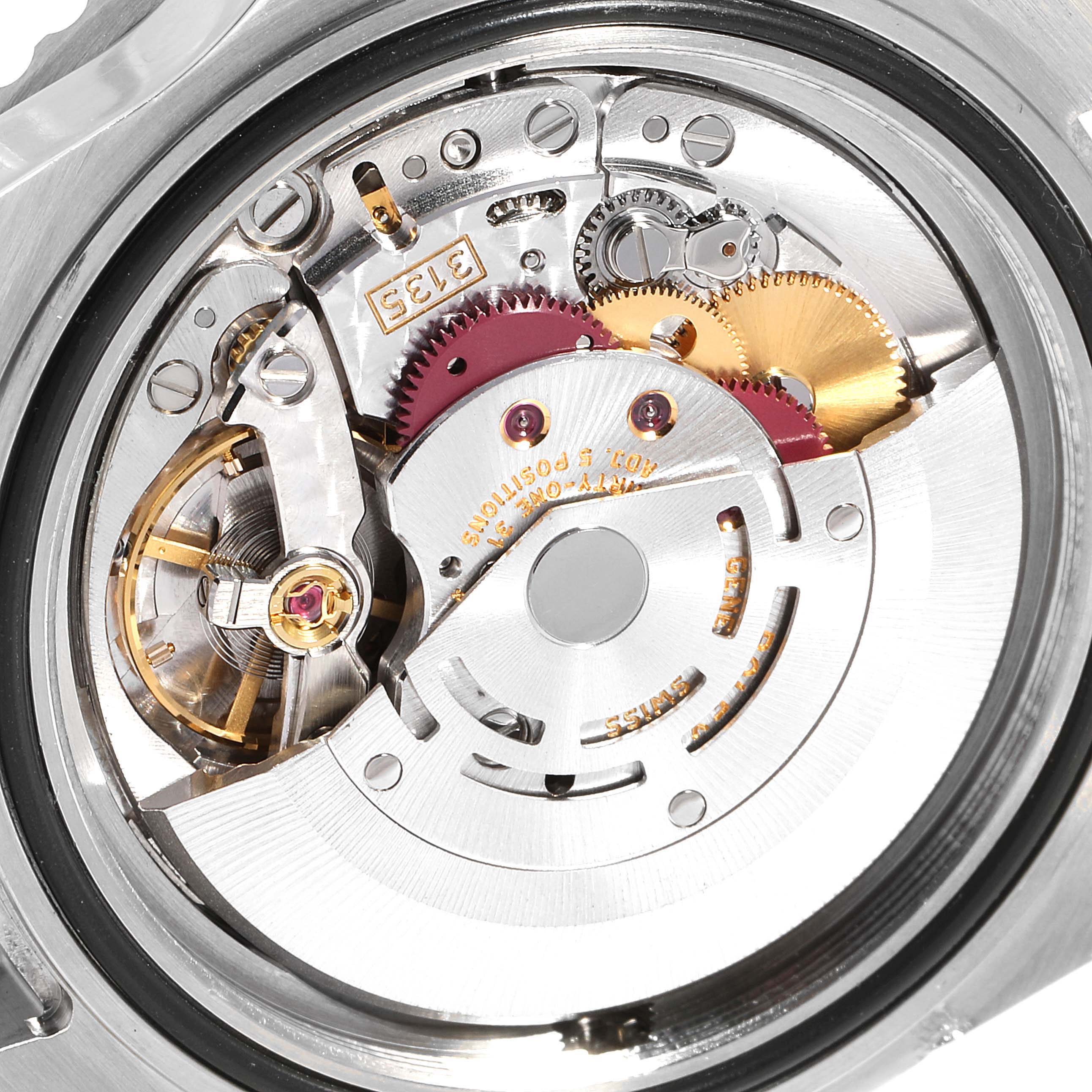 The image shows a close-up of the intricate internal movement of a Rolex Sea-Dweller 16600 Men
s Stainless Steel Black Dial 16600 Men
s Stainless Steel Black Dial watch.