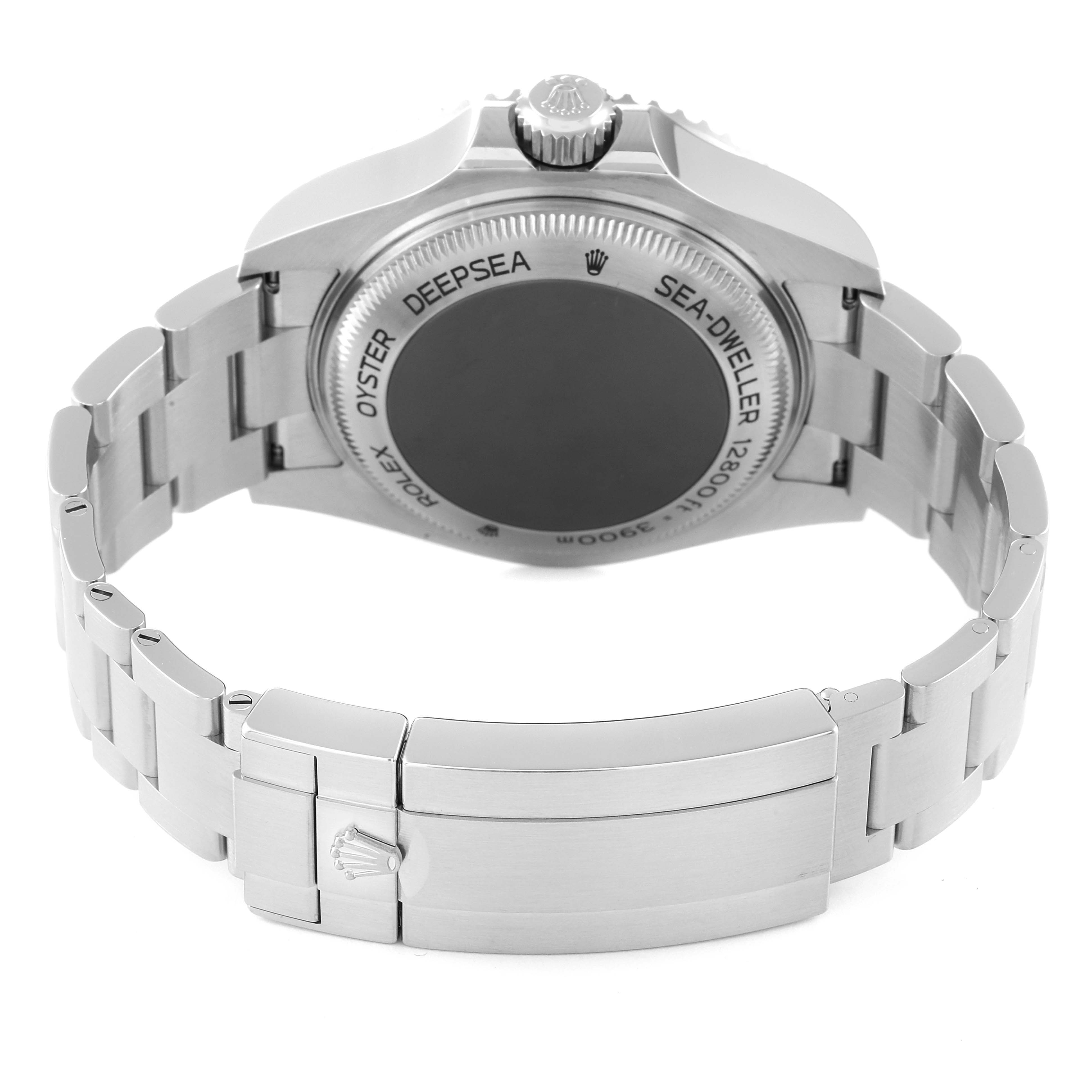 The image shows the back case and bracelet of a Rolex Sea-Dweller 126660 Men
s Stainless Steel Blue Dial 126660 Men
s Stainless Steel Blue Dial watch, emphasizing the engraved case back and the clasp.