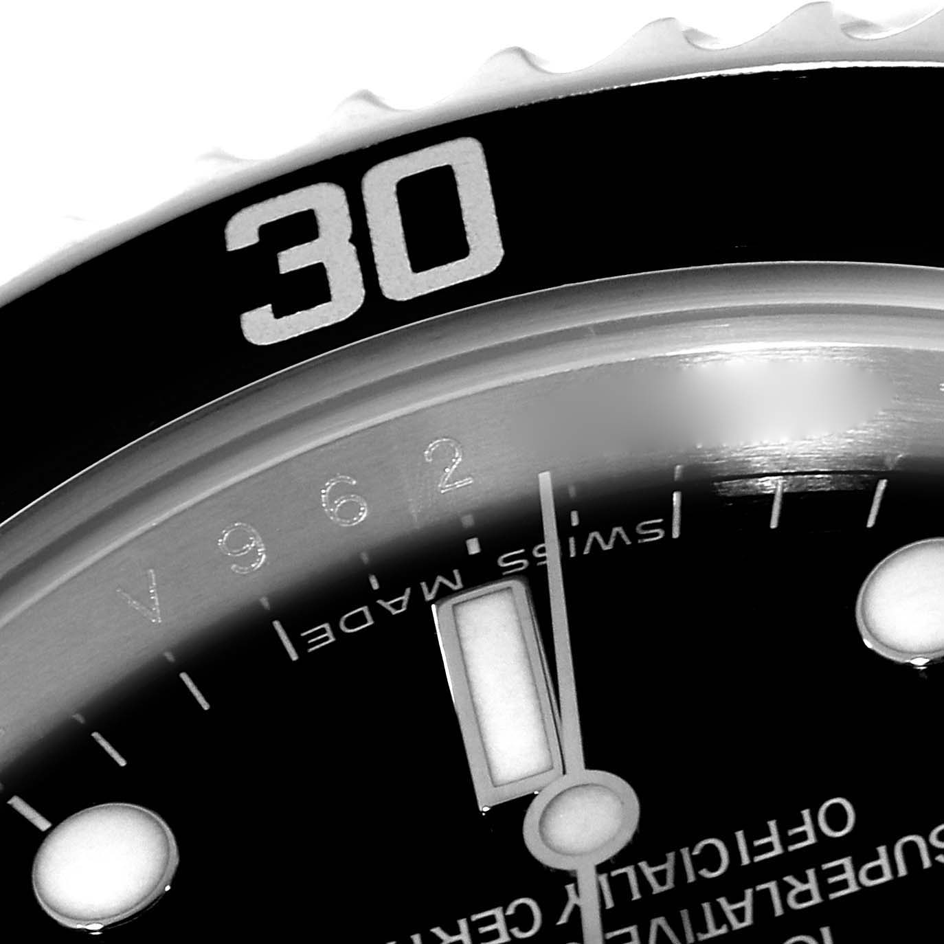 The image shows a close-up angle of the dial and bezel of a Rolex Submariner 14060M Men
s Stainless Steel Black Dial 14060M Men
s Stainless Steel Black Dial watch, highlighting the 30-minute mark and part of the "SWISS MADE" text.