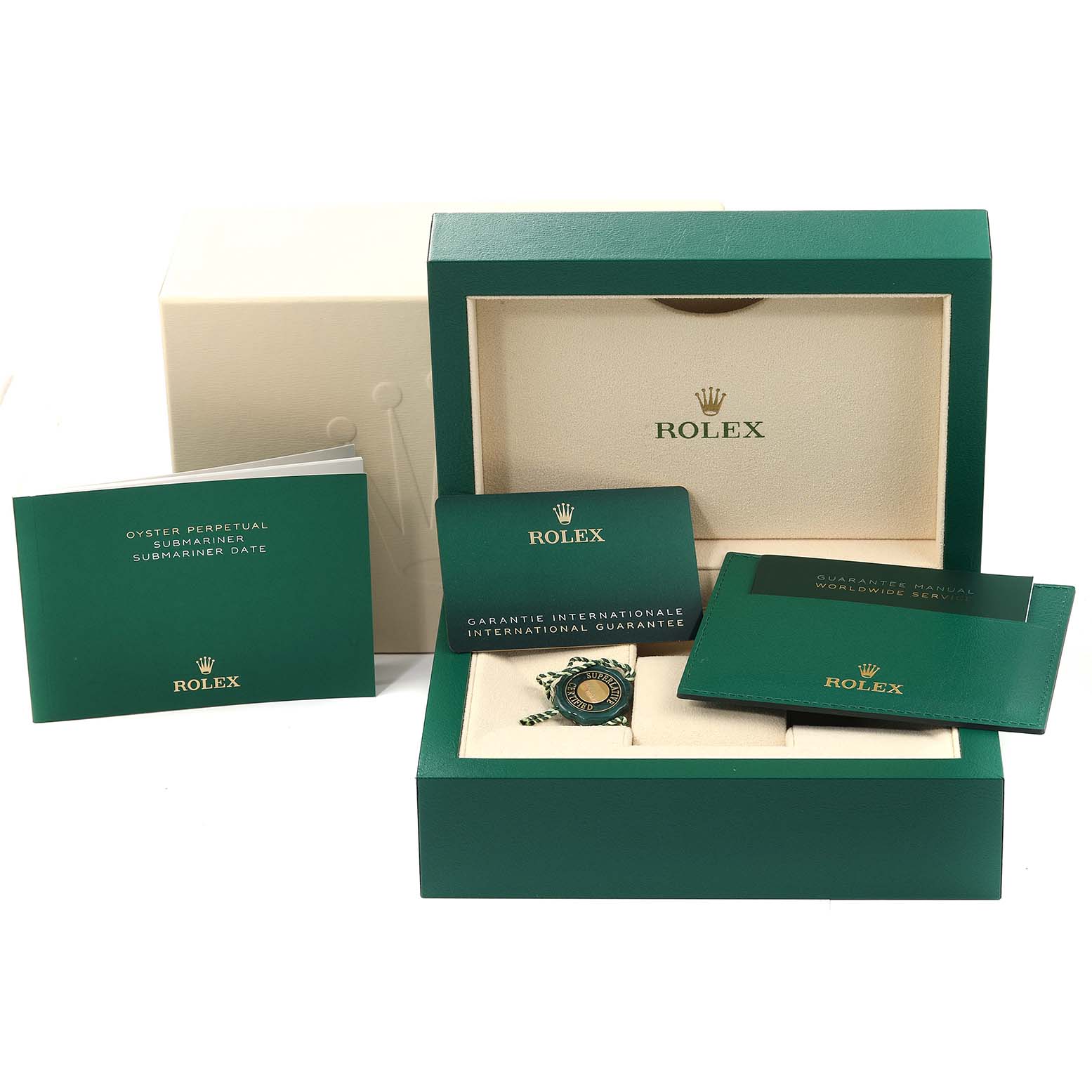 The image shows the packaging, guarantee, manual, and accessories of a Rolex Submariner 126613 Men
s Steel and Gold (two tone) Black Dial 126613 Men
s Steel and Gold (two tone) Black Dial watch from a front angle.