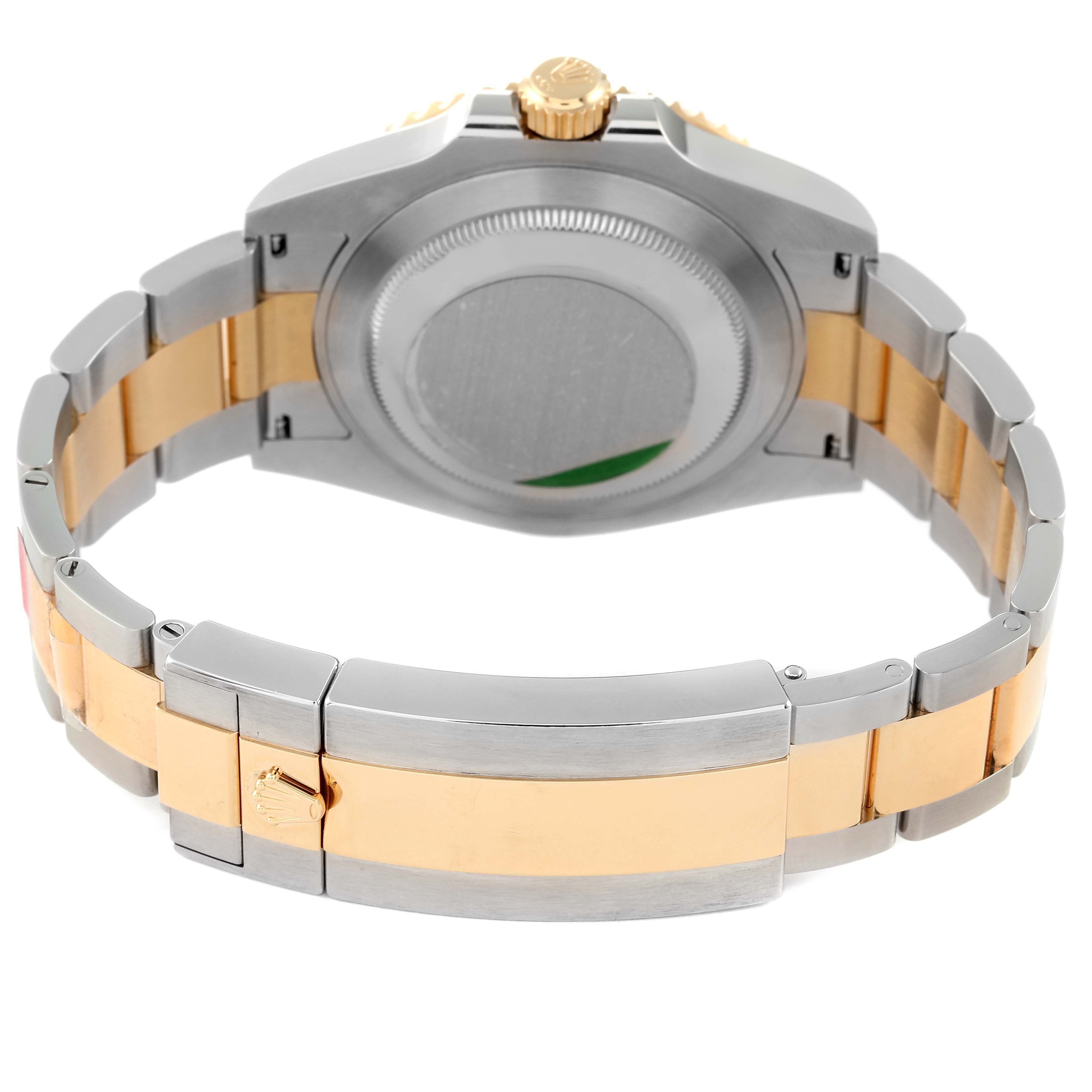 This image shows the back view of a Rolex Submariner 126613 Men
s Steel and Gold (two tone) Black Dial 126613 Men
s Steel and Gold (two tone) Black Dial, including the case back, crown, and the bracelet clasp.
