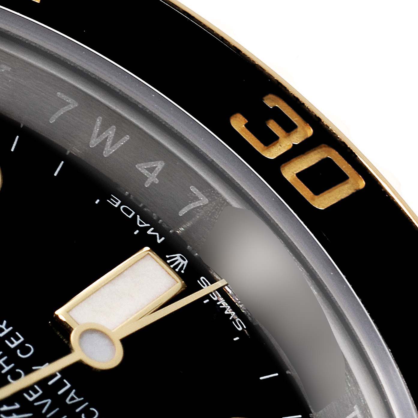 The image shows a close-up angle of the dial and bezel, specifically focusing on the "30" mark, of the Rolex Submariner 126613 Men
s Steel and Gold (two tone) Black Dial 126613 Men
s Steel and Gold (two tone) Black Dial watch.