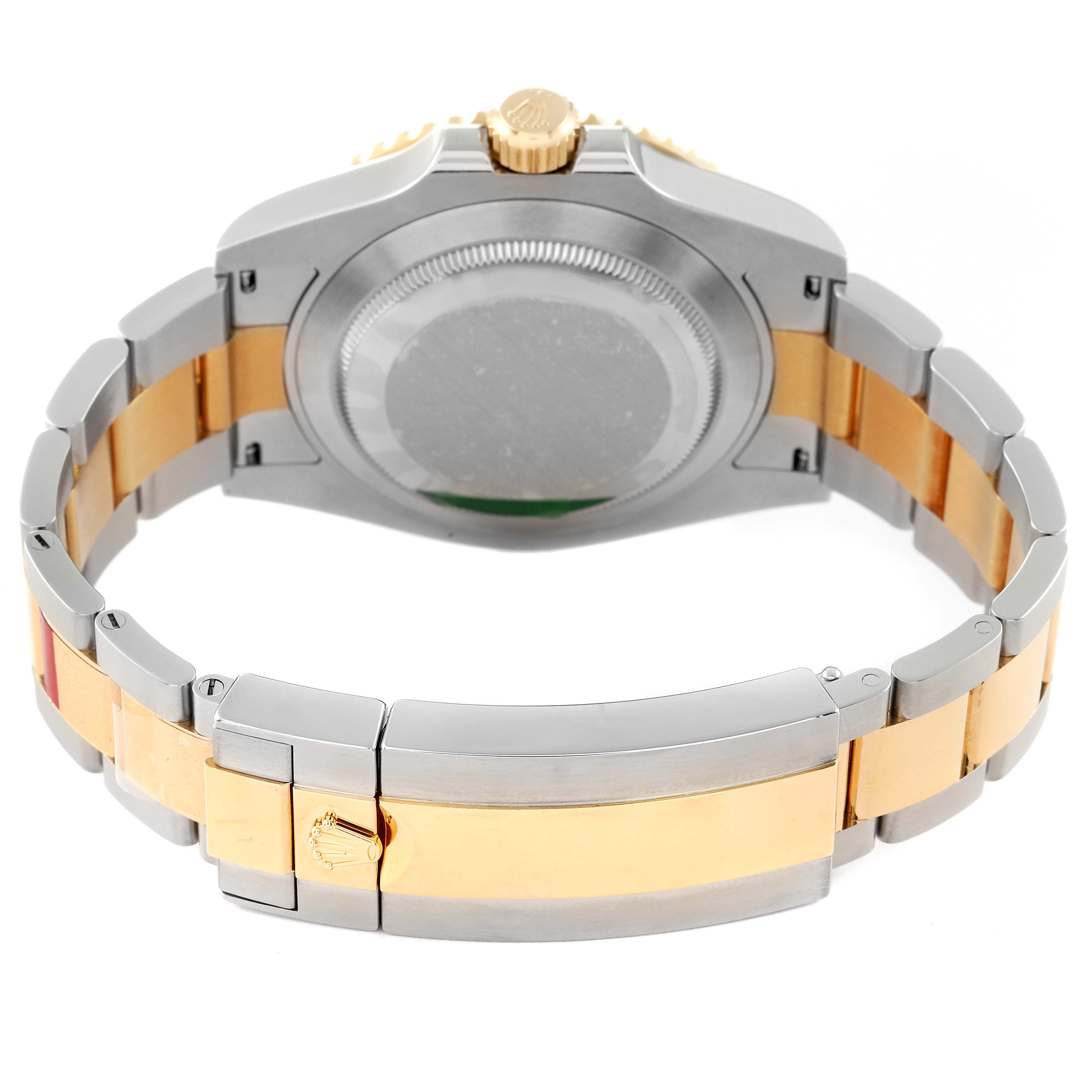 This image shows the back side and bracelet of a Rolex Submariner 126613 Men
s Steel and Gold (two tone) Blue Dial 126613 Men
s Steel and Gold (two tone) Blue Dial watch, highlighting the clasp and case back.