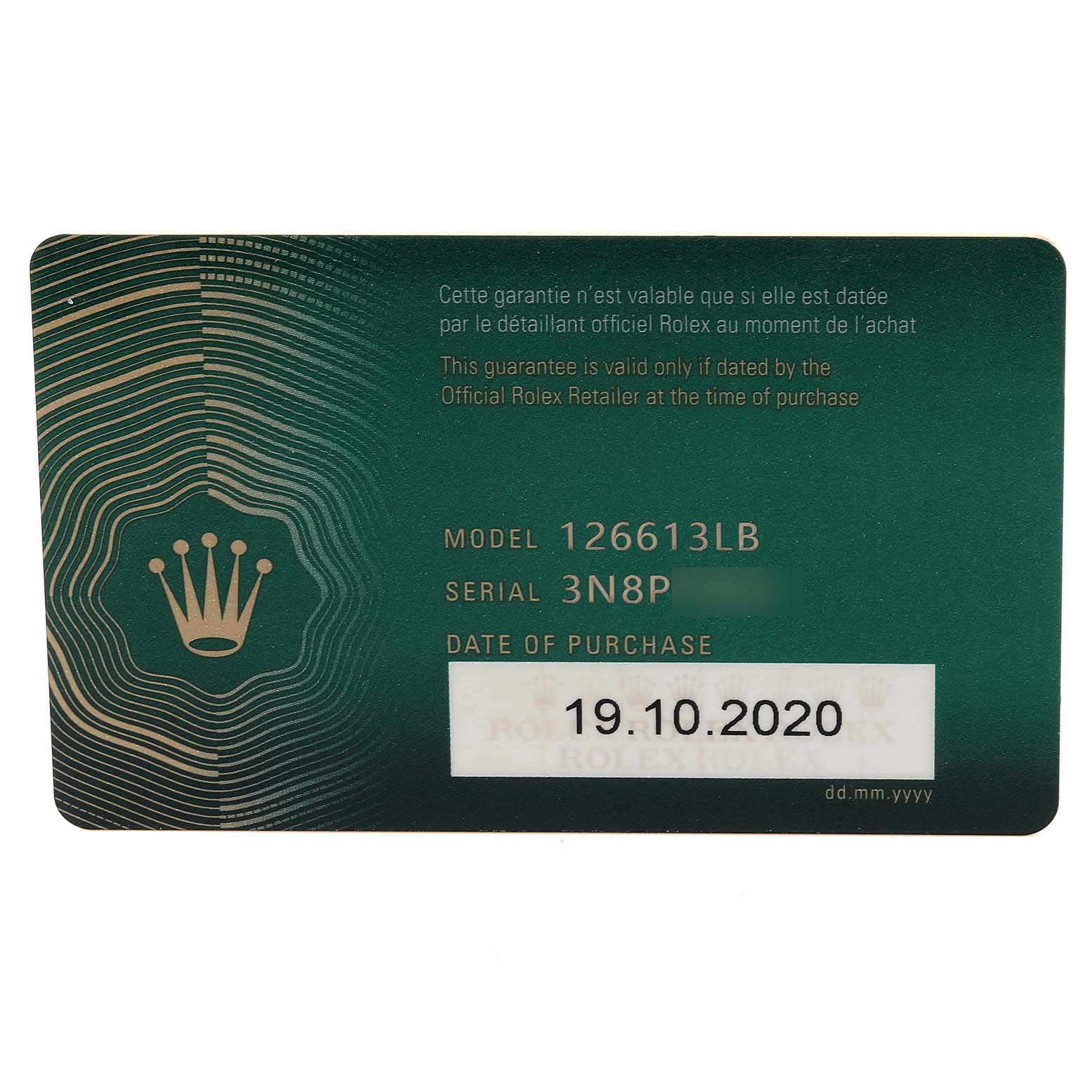This image shows a Rolex guarantee card for the Submariner model, detailing the model number, serial number, and the date of purchase.