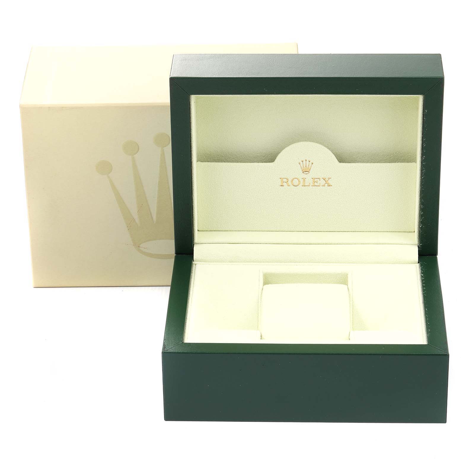 The image shows a green Rolex Submariner 16610 Men
s Stainless Steel Black Dial 16610 Men
s Stainless Steel Black Dial watch box and its beige outer packaging with the logo.