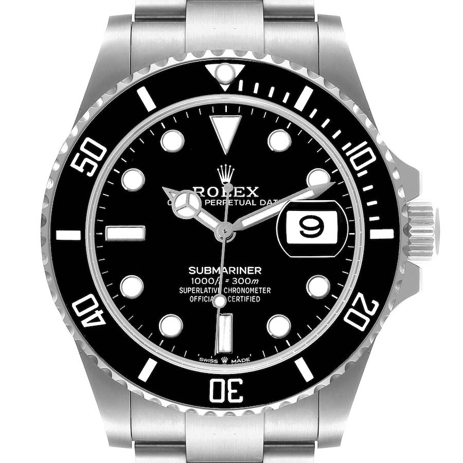 The image shows a front angle of the Rolex Submariner watch face and bezel, highlighting the dial and date window.