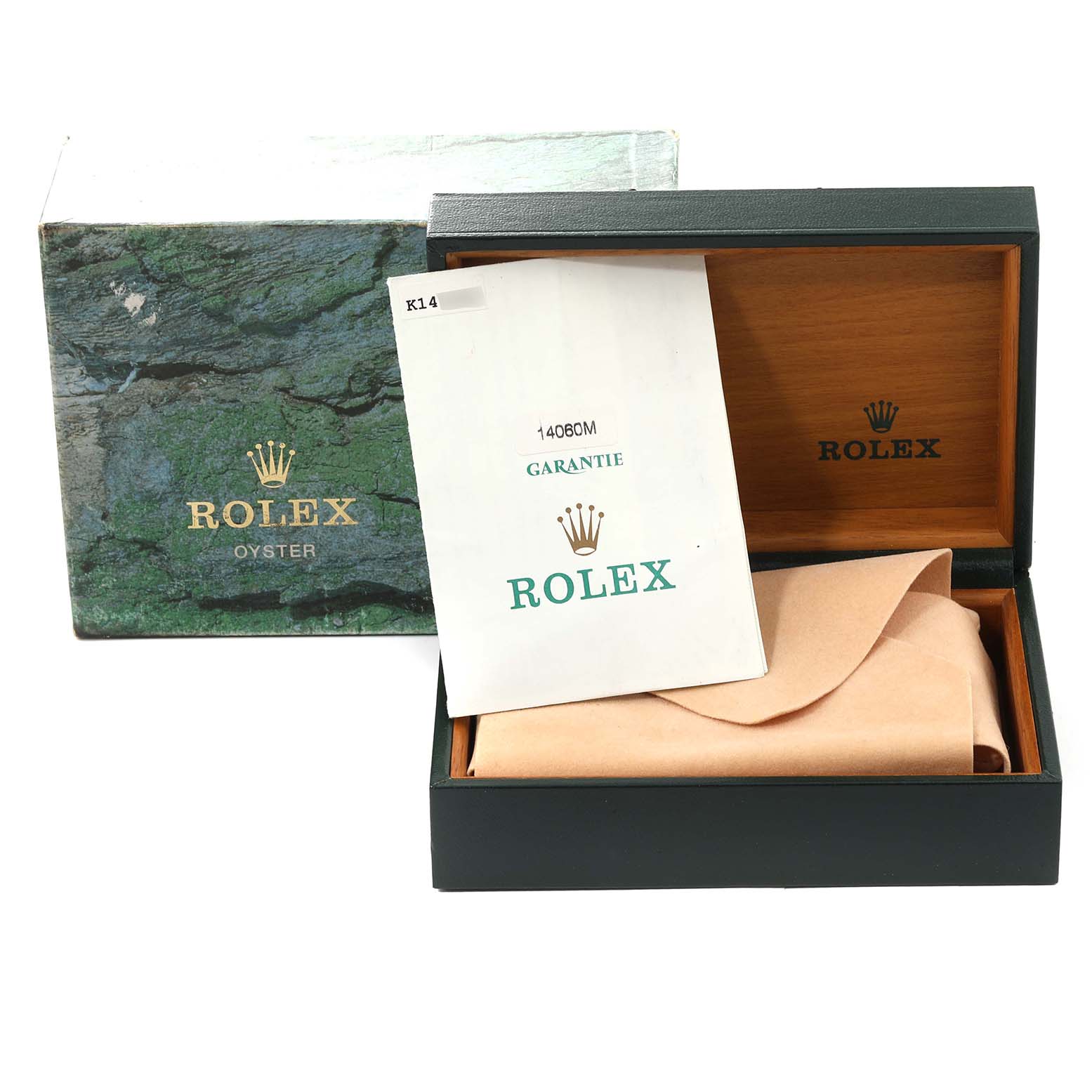 The image shows the open box and guarantee paperwork for a Rolex Submariner 14060M Men's Stainless Steel Black Dial 14060M Men's Stainless Steel Black Dial, including outer packaging and inner documentation.