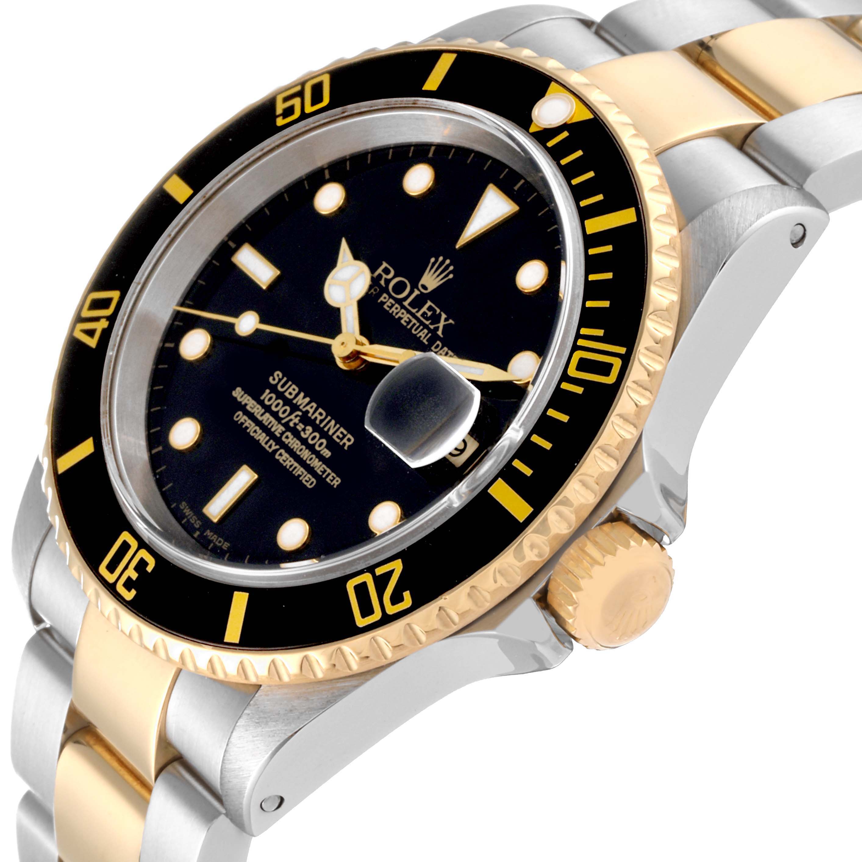 This image shows the Rolex Submariner 16613 Men's Steel and Gold (two tone) Black Dial 16613 Men's Steel and Gold (two tone) Black Dial watch at an angled close-up view, highlighting its black dial, bezel, and two-tone bracelet.