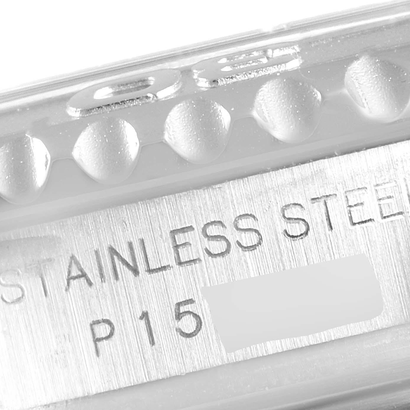 The image shows a close-up of the side of the Rolex Yacht-Master 169622 Women's Stainless Steel Silver Dial 169622 Women's Stainless Steel Silver Dial watch, highlighting the stainless steel engraving and part of the bezel.