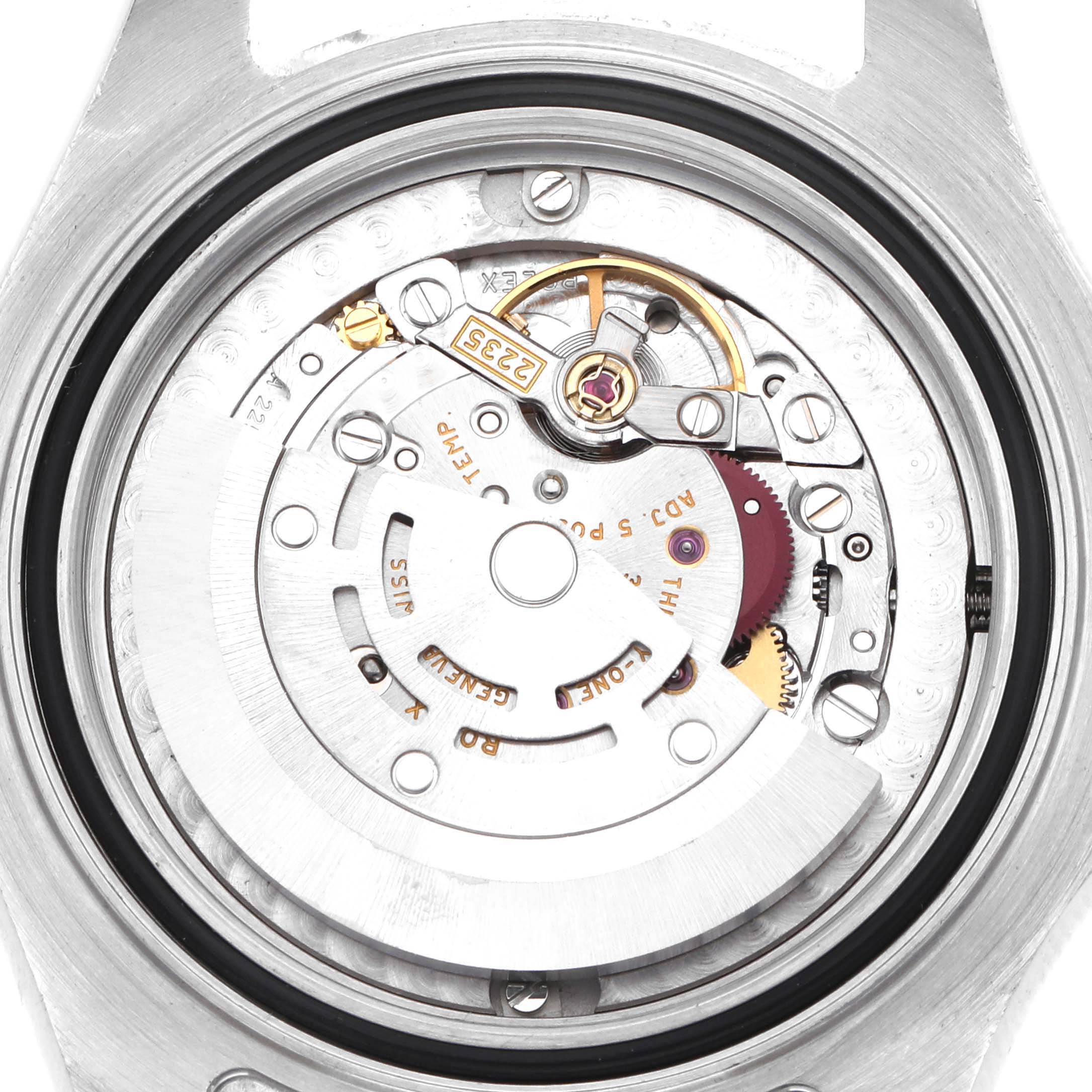 The image shows a close-up of the Rolex Yacht-Master 168622 Men
s Stainless Steel Silver Dial movement from the back, highlighting gears and components.