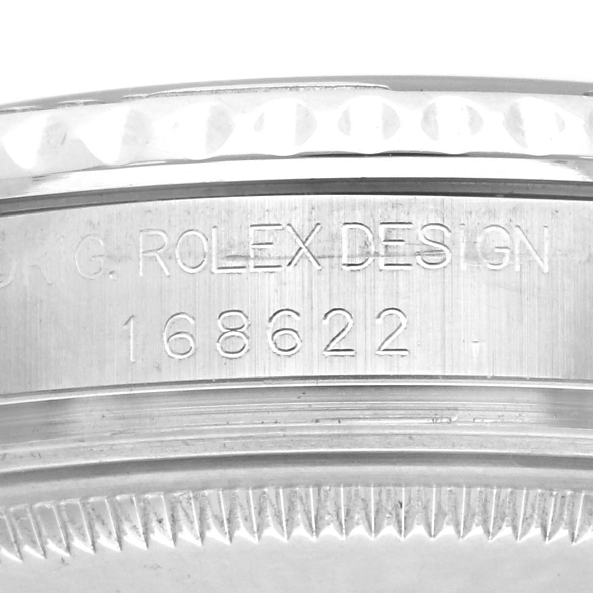 The image shows a close-up of the side of the Rolex Yacht-Master 168622 Men
s Stainless Steel Silver Dial, highlighting the engraved model number and bezel.