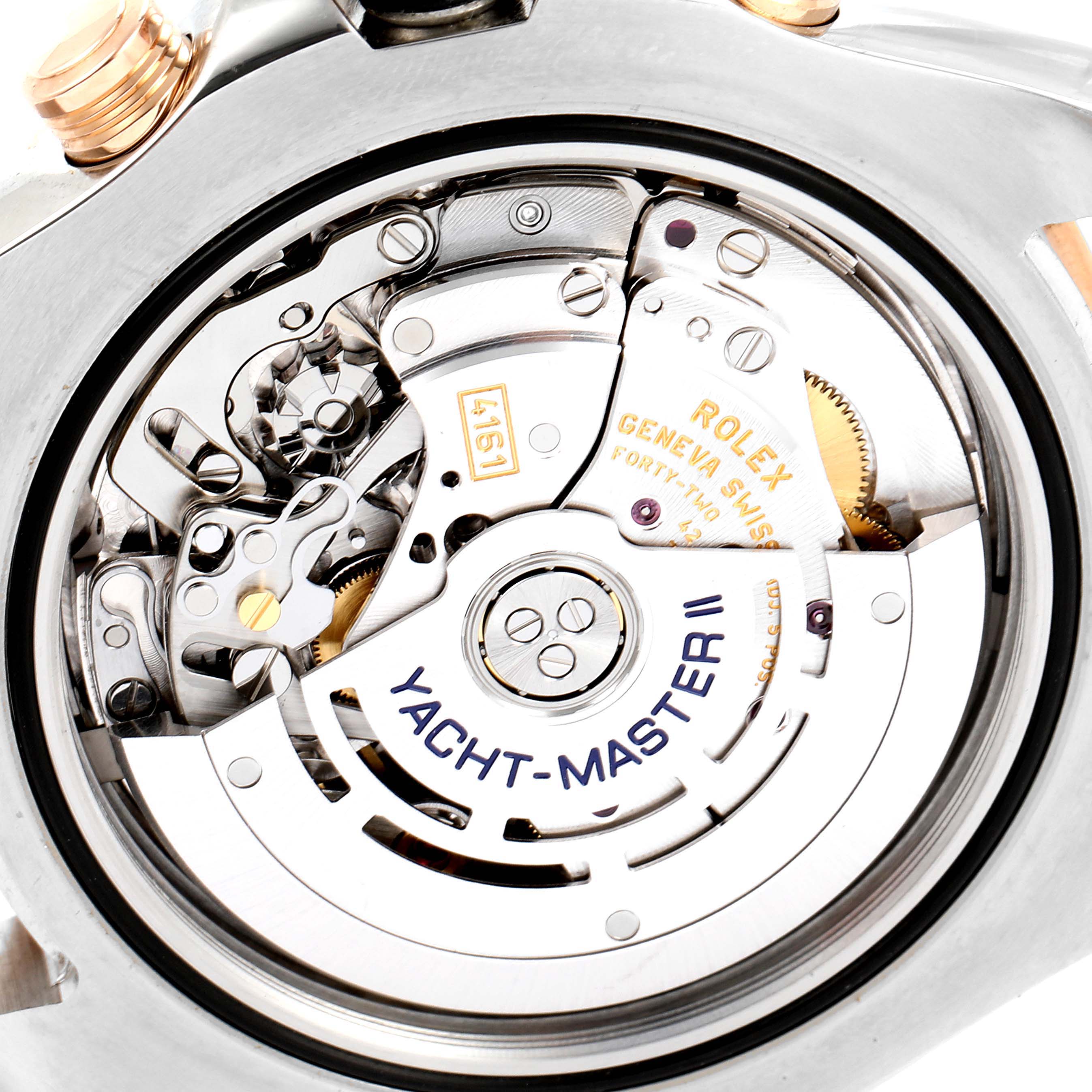 The image shows a close-up of the movement mechanism inside a Rolex Yacht-Master 116681 Men's Steel and Gold (two tone) White Dial 116681 Men's Steel and Gold (two tone) White Dial II watch.