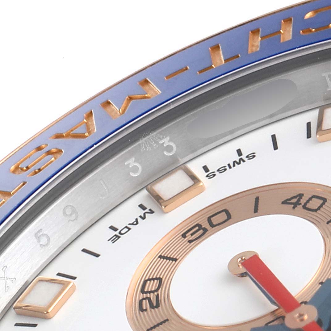 This angle shows the bezel and part of the dial of the Rolex Yacht-Master 116681 Men's Steel and Gold (two tone) White Dial 116681 Men's Steel and Gold (two tone) White Dial watch, highlighting its bold numerals and markers.