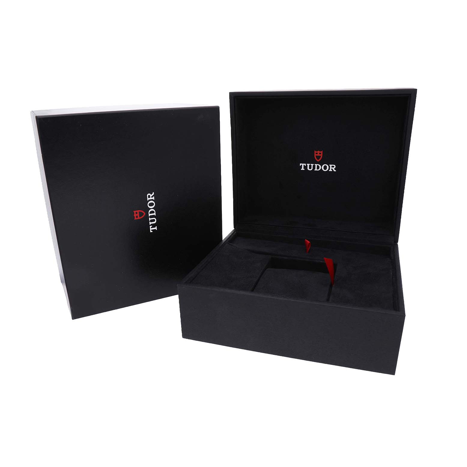 The image shows the open box for a Tudor Heritage Black Bay M79210CNU Men's Ceramic Black Dial watch, featuring the brand logo inside and on the lid.