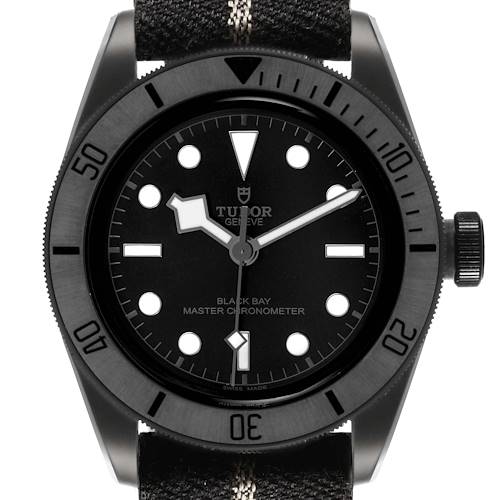 The image shows a front angle of the Tudor Heritage Black Bay M79210CNU Men's Ceramic Black Dial watch, highlighting its black dial, bezel, and strap.