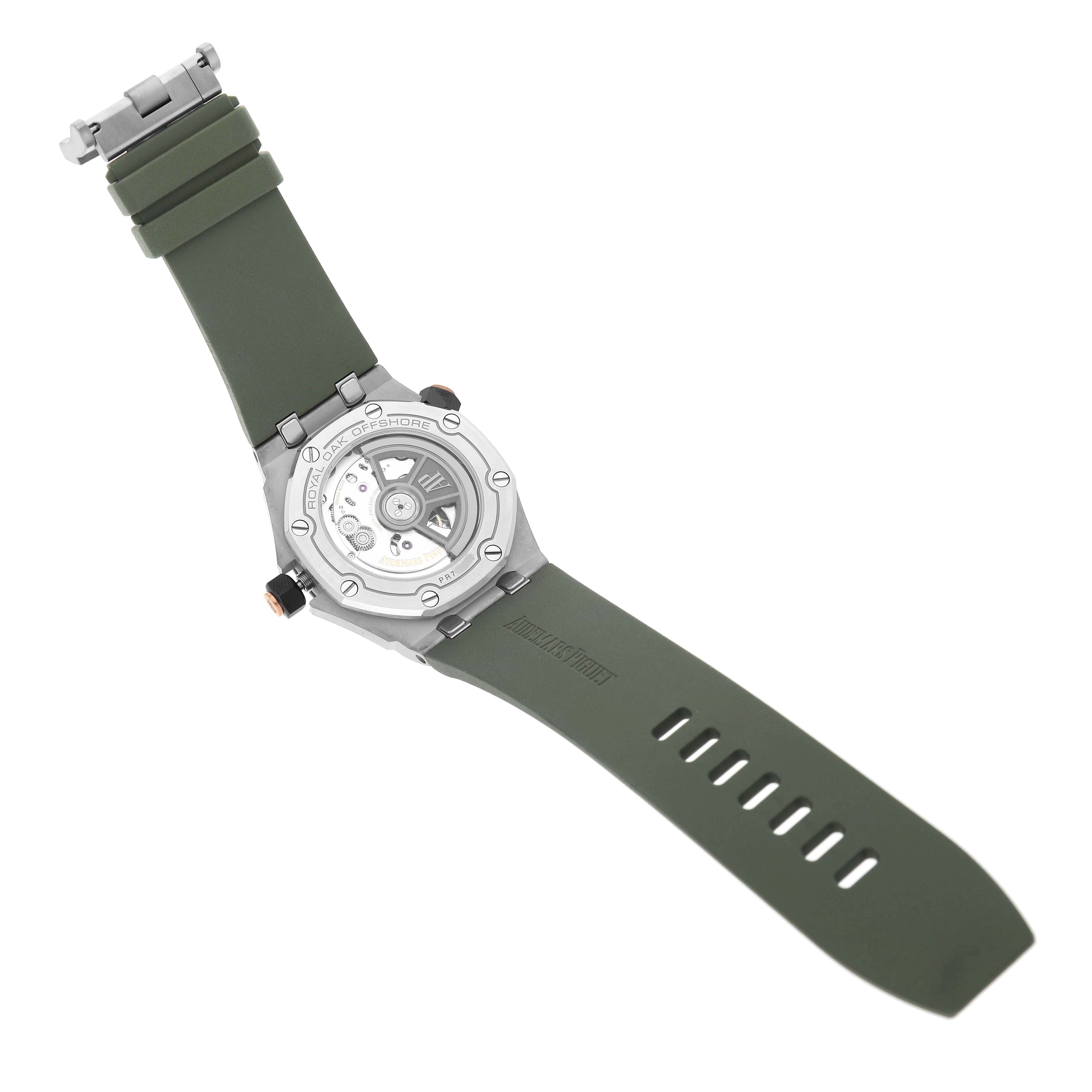 The image shows the back of the Audemars Piguet Royal Oak Offshore 15720ST.OO.A052CA.01 Men's Stainless Steel Green Dial watch, highlighting its movement and green strap.