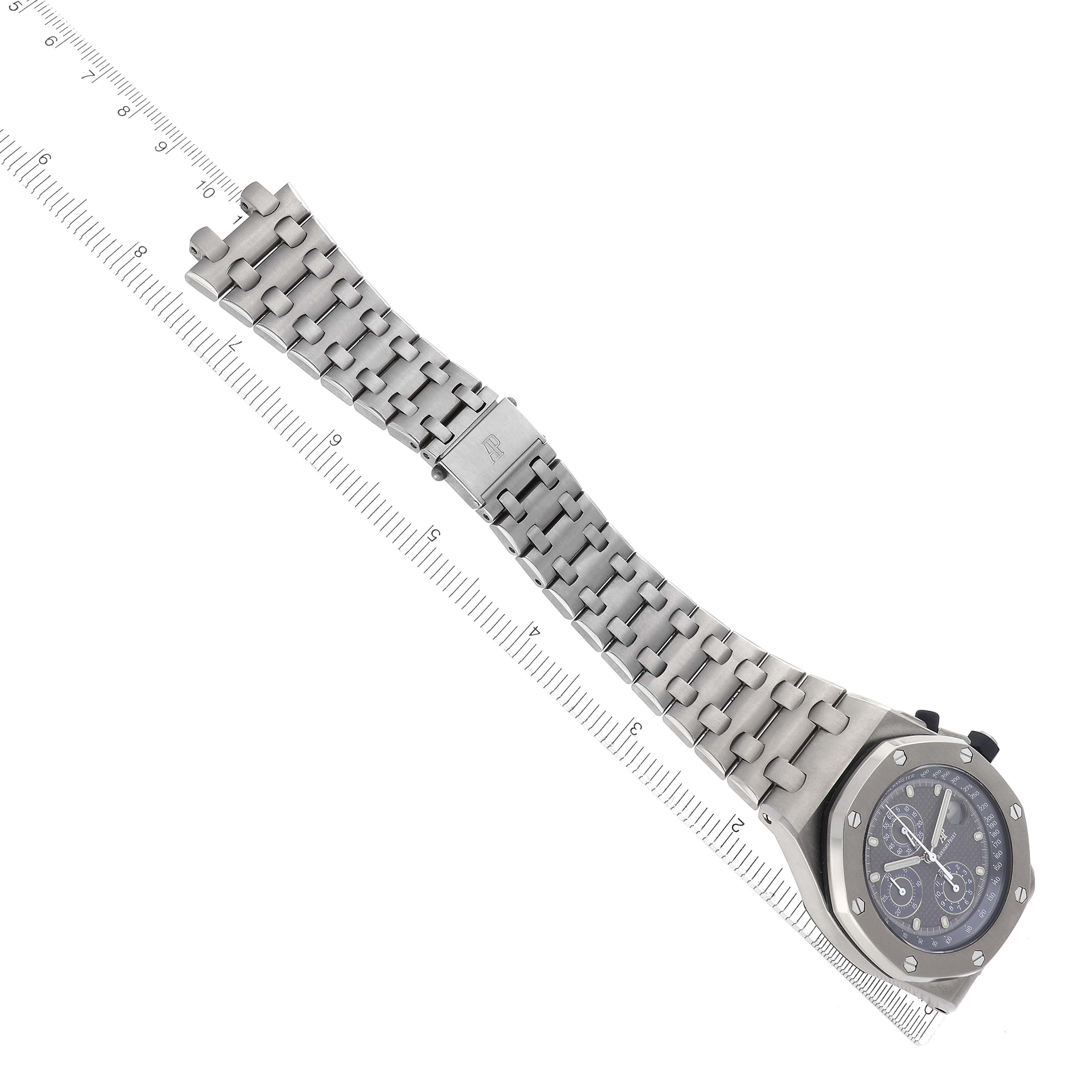 The image shows a Royal Oak Offshore by Audemars Piguet at a top angle, displaying the full watch and bracelet alongside a ruler.