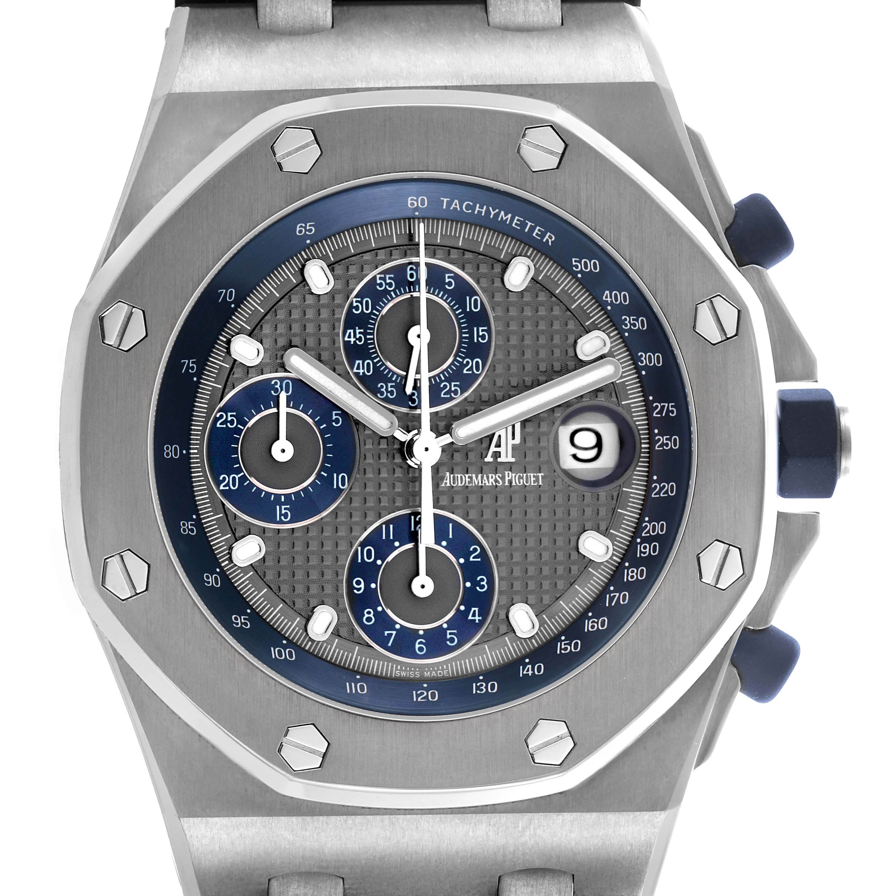 The Audemars Piguet Royal Oak Offshore 25721TI.OO.10000TI.301 Men
s Titanium Grey Dial is shown from a front angle, displaying its blue dial, chronograph sub-dials, tachymeter, and date window.