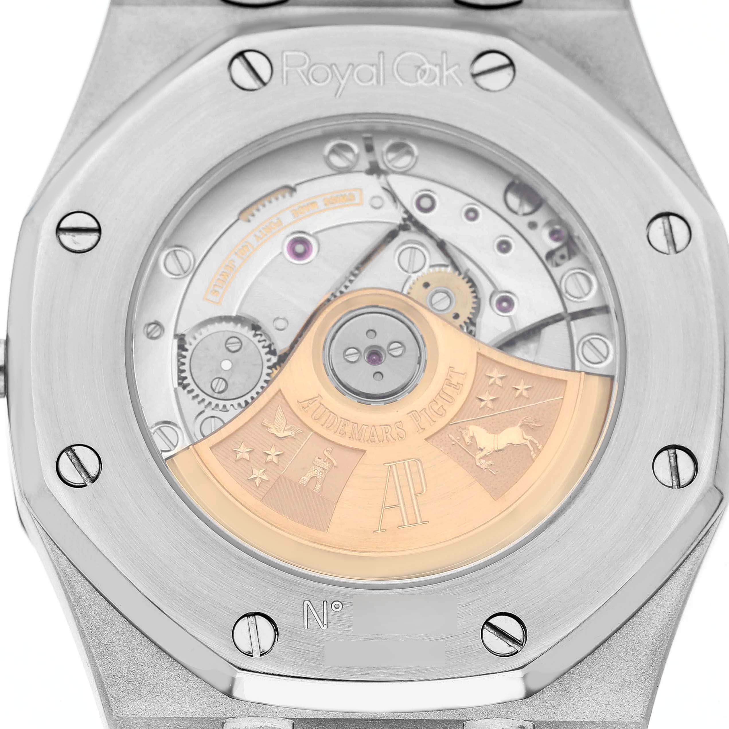 The image shows the case back of the Audemars Piguet Royal Oak 83220 Men's Stainless Steel Blue Dial, highlighting the inner movement and rotor.
