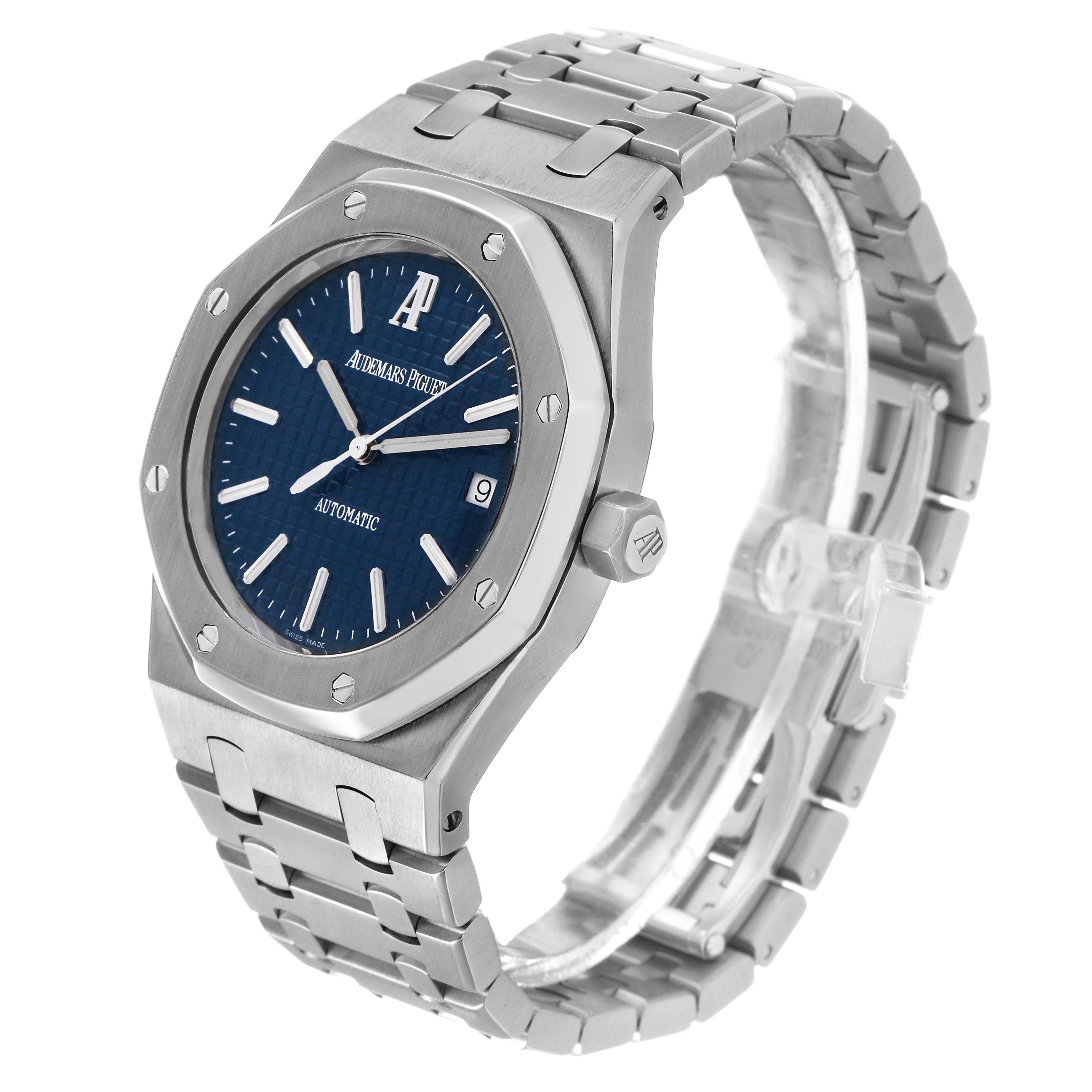 The Royal Oak by Audemars Piguet is shown at a slight angle, highlighting its octagonal bezel, blue dial, bracelet, and crown.