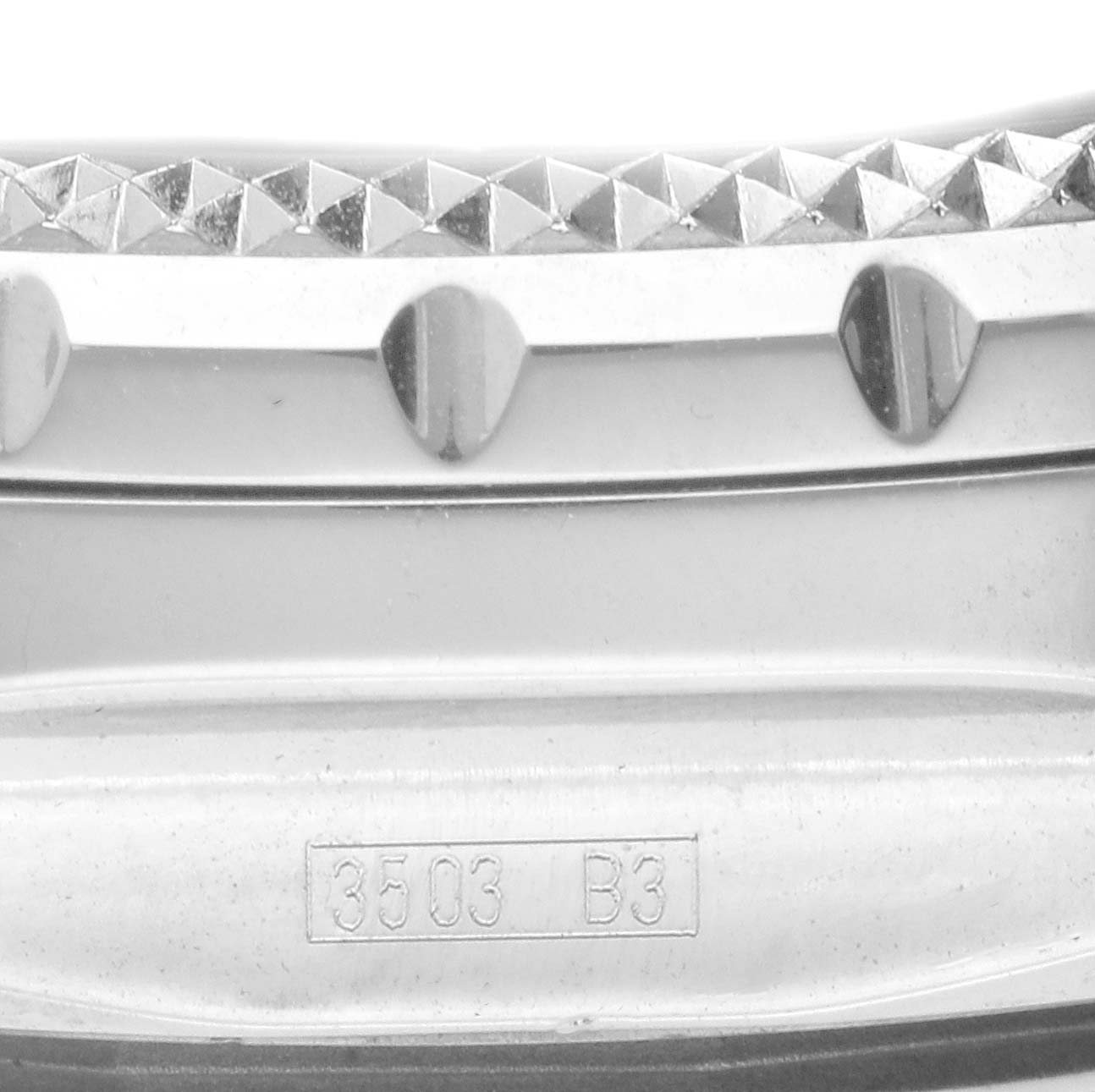 This image shows a close-up of the bezel and part of the casing for a Bentley model by Breitling.