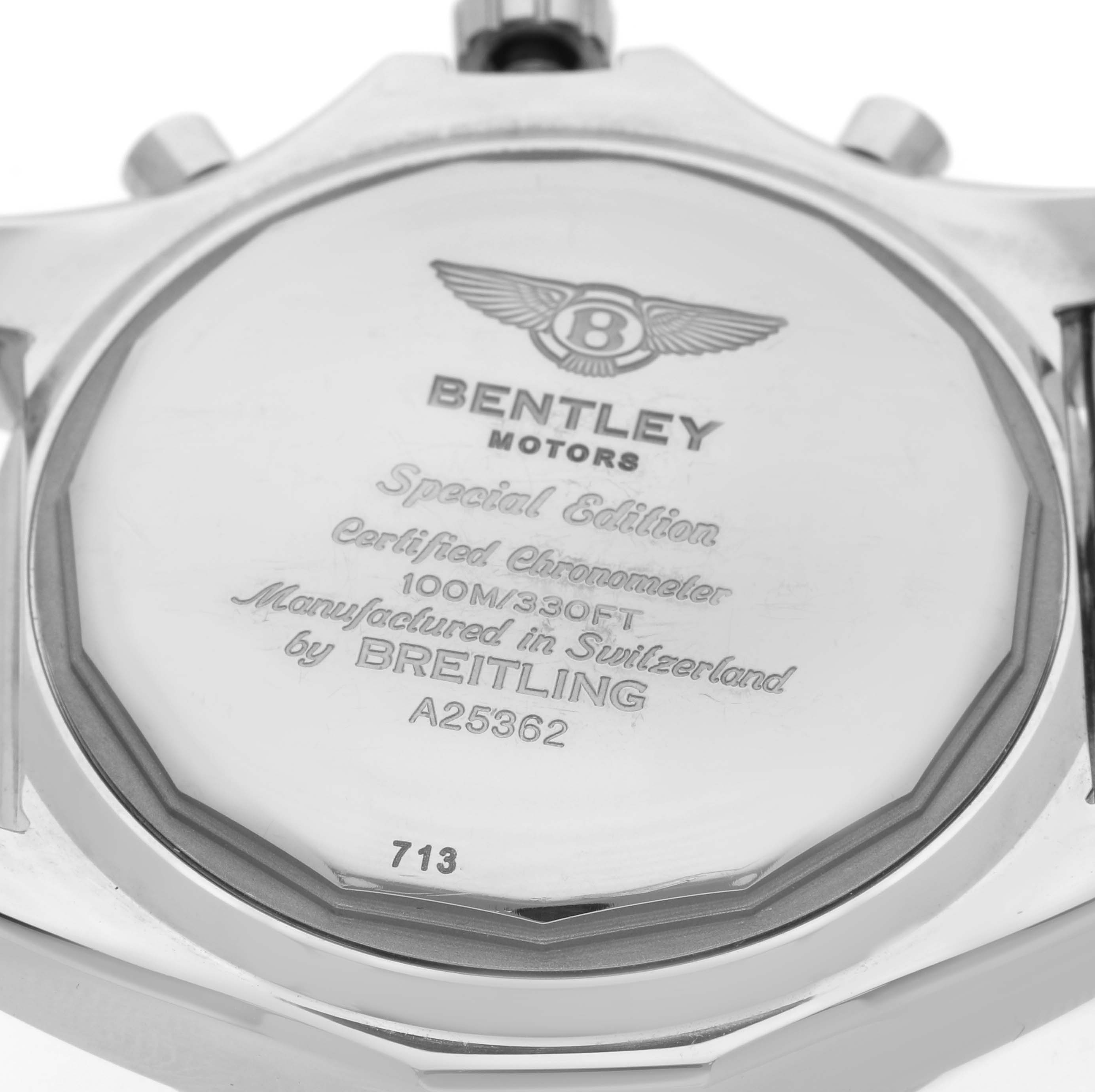 The image shows the back case of a Bentley model watch by Breitling, highlighting the engraved specifications.