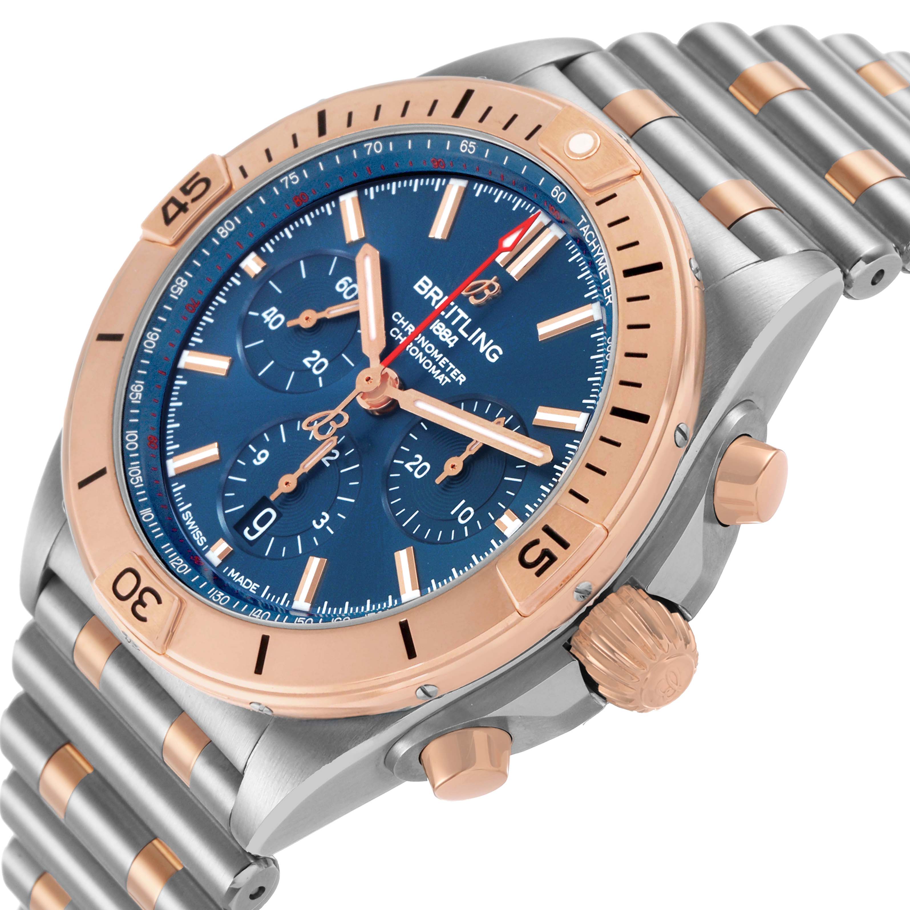 The Breitling Chronomat UB0134101C1U1 Men's Stainless Steel Blue Dial watch is shown at an angle highlighting the bezel, crown, and part of the bracelet.