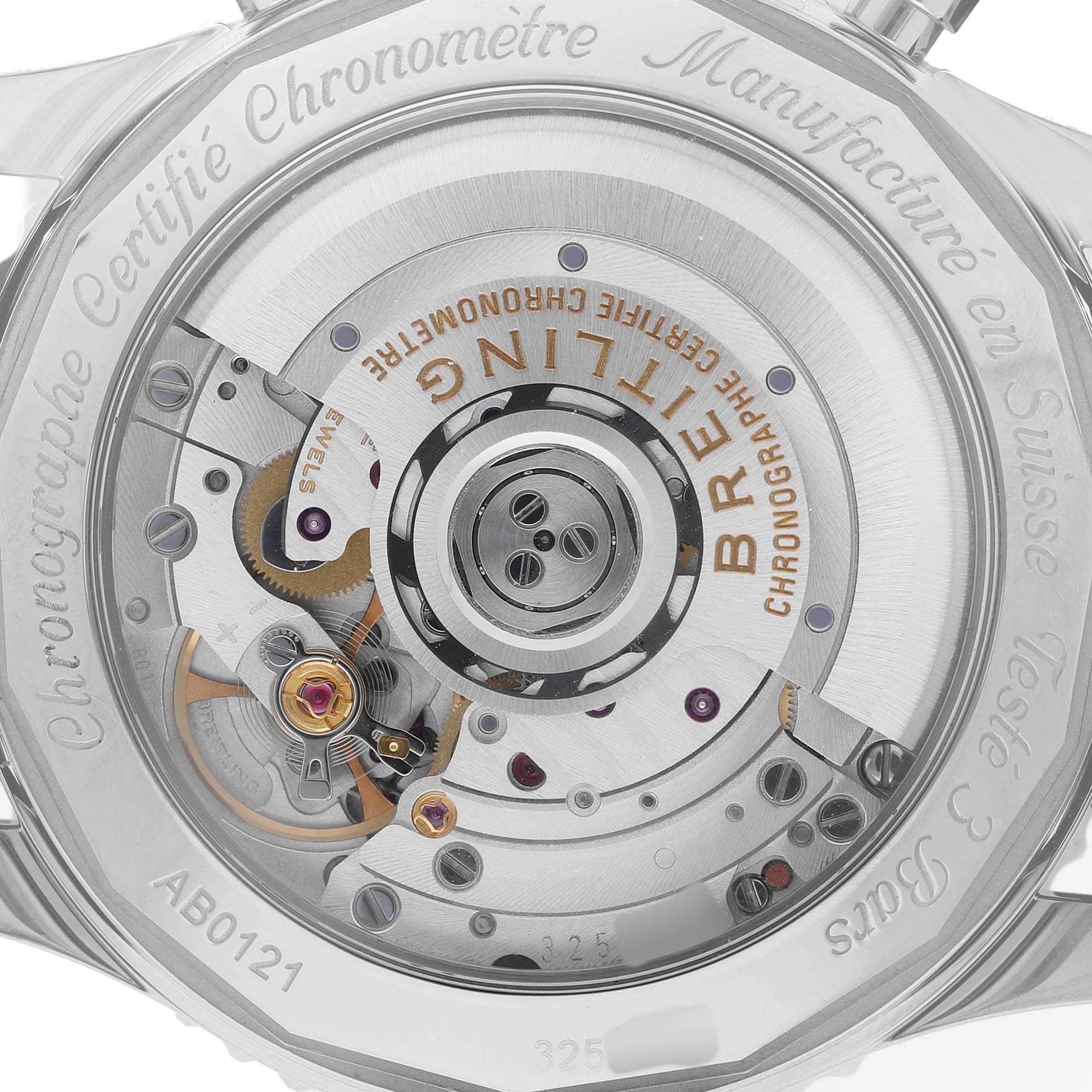 The image shows the rear view of a Breitling Navitimer AB0121 Men's Stainless Steel Silver Dial watch, displaying its intricate movement and rotor through a transparent case back.