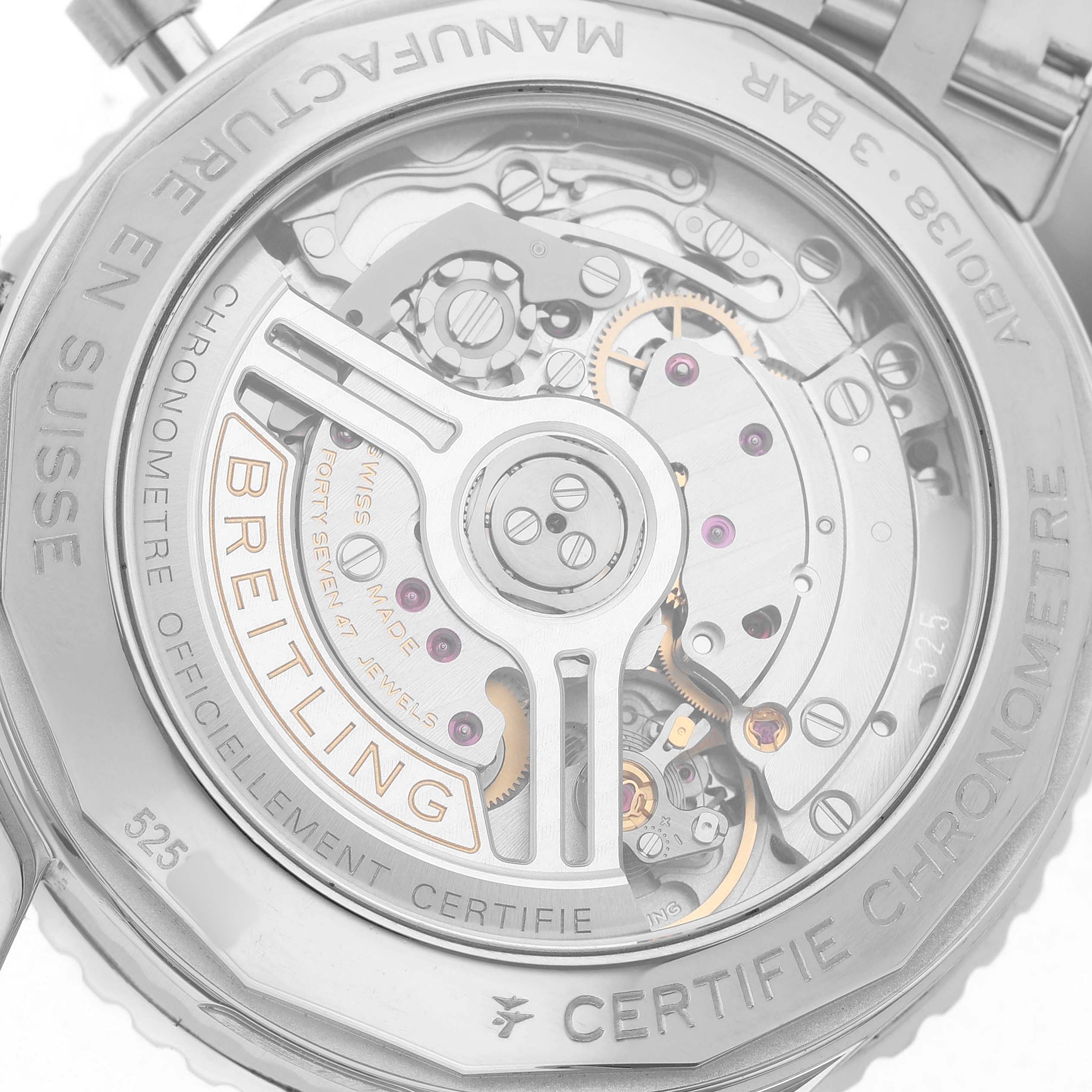 The image shows the back of a Breitling Navitimer AB0138 Men's Stainless Steel Blue Dial watch, highlighting its intricate mechanical movement.