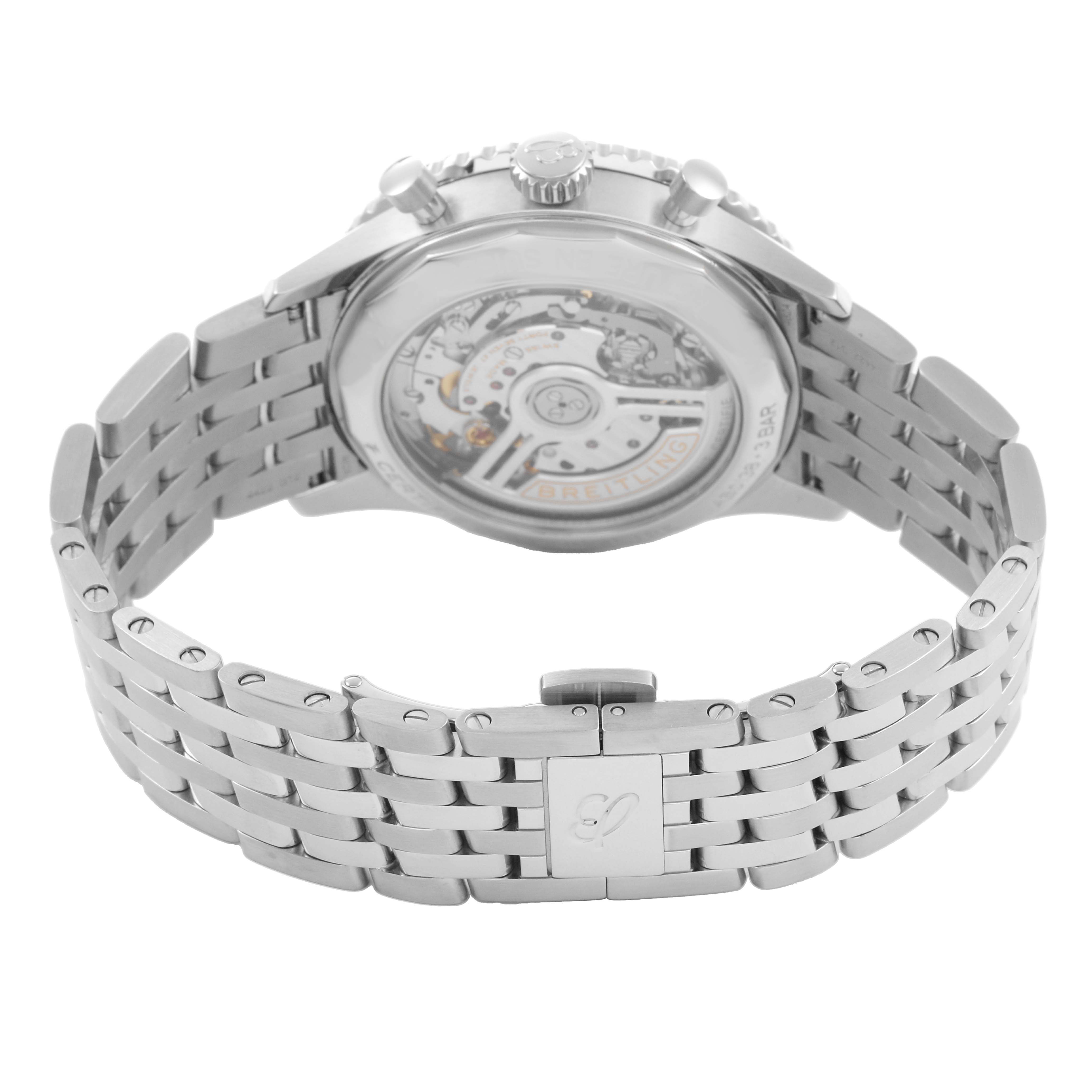 The image shows the back view of a Breitling Navitimer AB0138 Men's Stainless Steel Blue Dial watch, highlighting its transparent case back and metal bracelet.