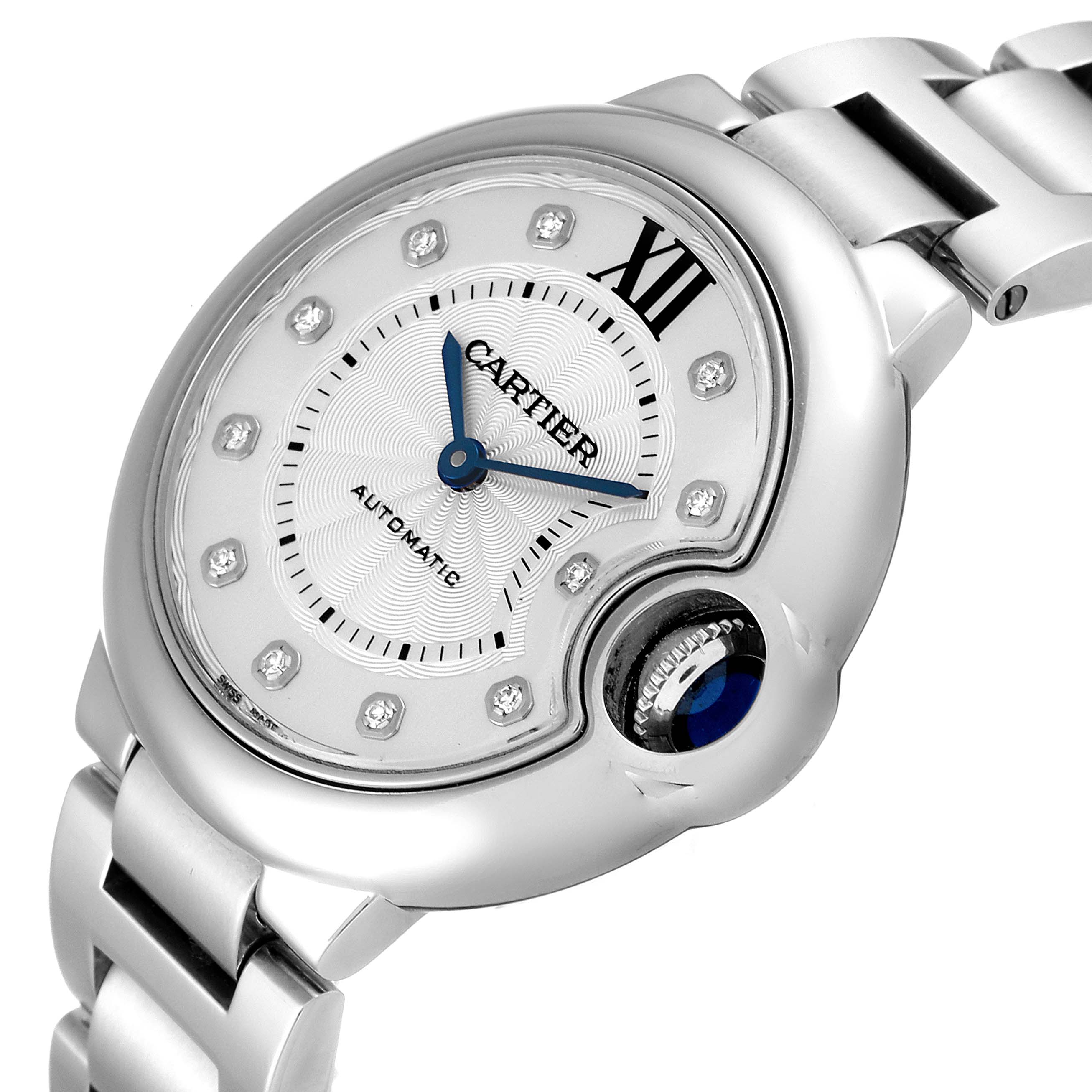 The image shows a close-up view of the Cartier Ballon Bleu WE902074 Women
s Stainless Steel Silver Dial WE902074 Women
s Stainless Steel Silver Dial watch, focusing on the dial and part of the bracelet from an angled perspective.