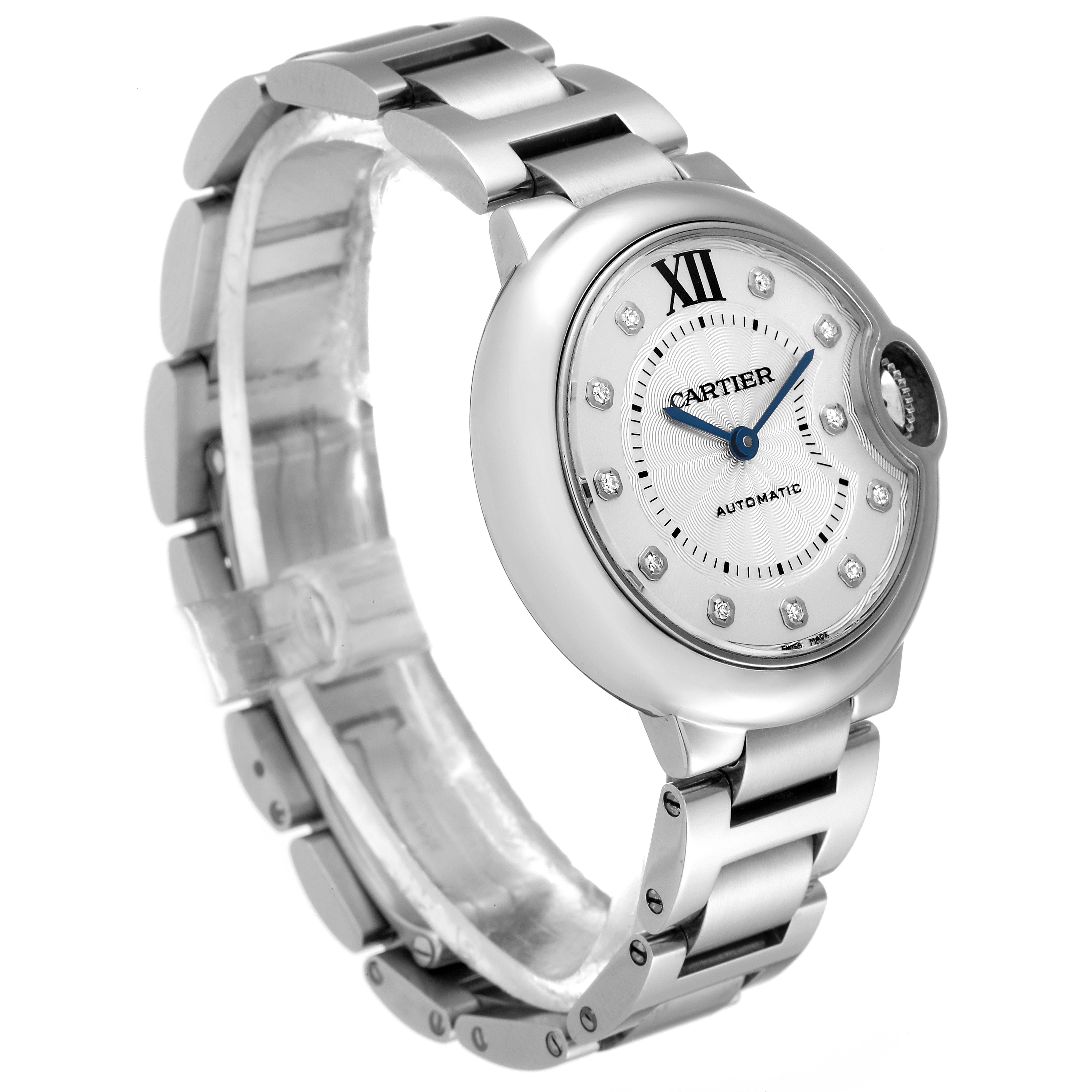 The image shows a Cartier Ballon Bleu WE902074 Women
s Stainless Steel Silver Dial WE902074 Women
s Stainless Steel Silver Dial watch at a three-quarter angle, highlighting the dial, bracelet, and crown.
