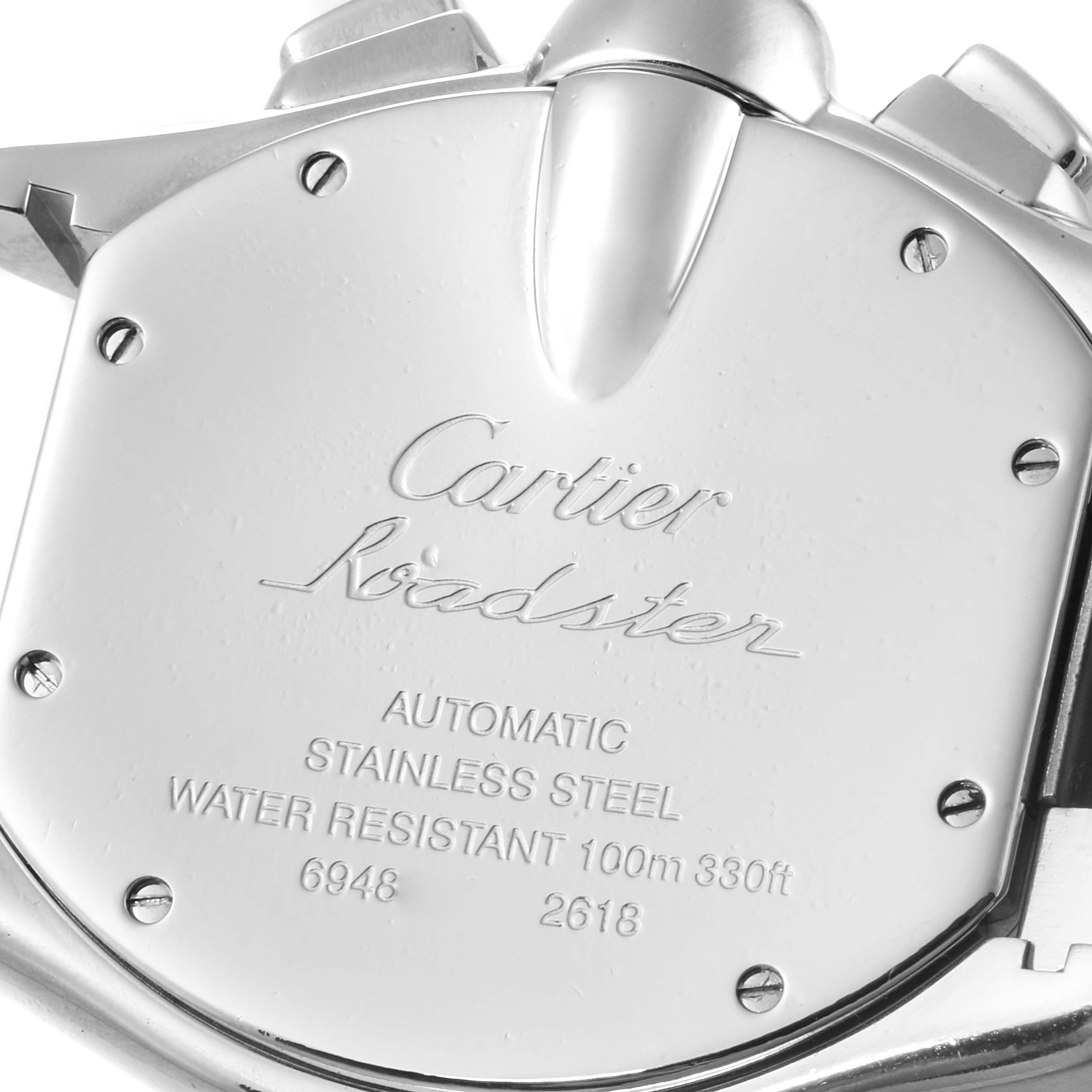 The image shows the back of a Cartier Roadster W62020X6 Men
s Stainless Steel Black Dial W62020X6 Men
s Stainless Steel Black Dial watch, highlighting its stainless steel case, automatic movement, and water resistance specifications.