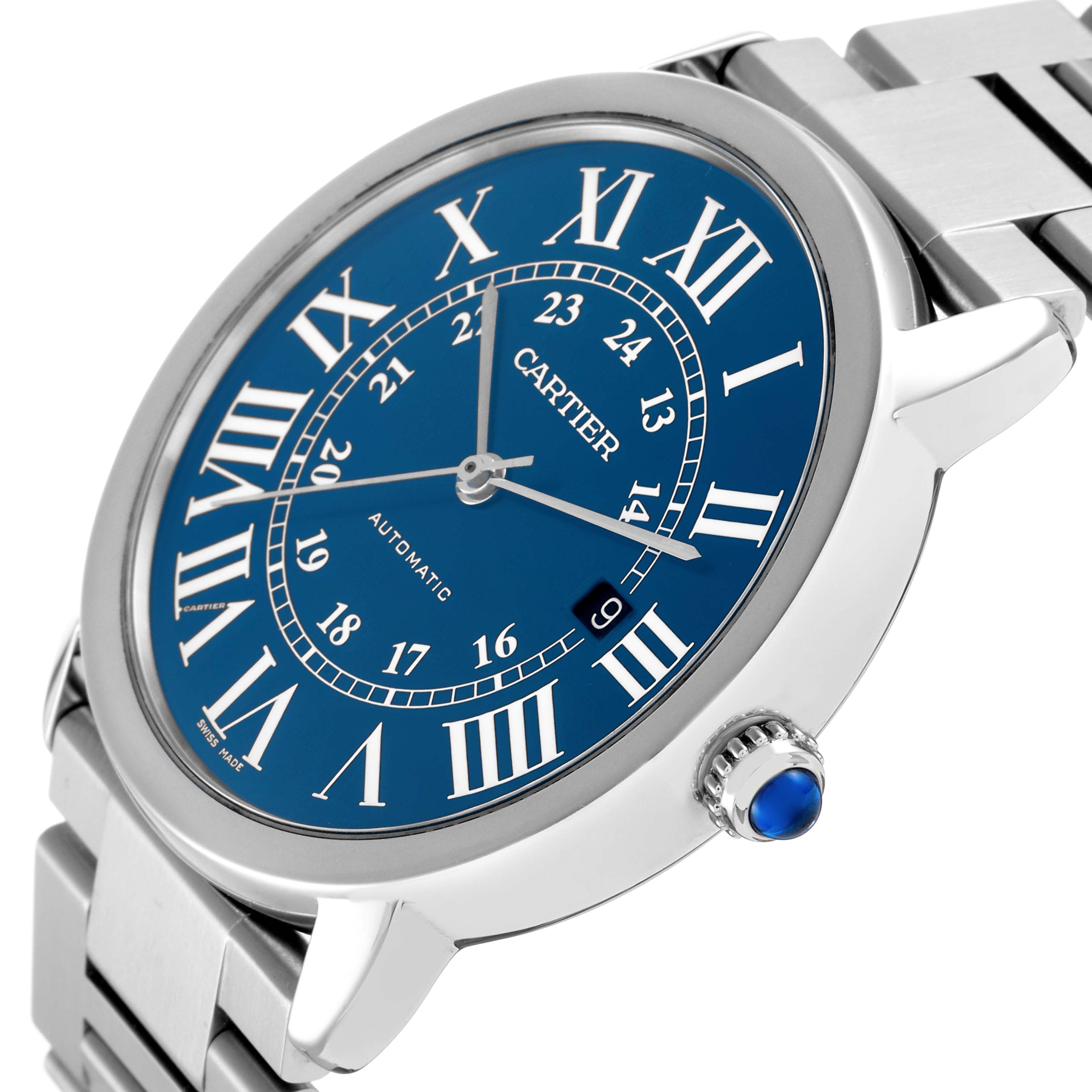 The Cartier Ronde WSRN0023 Men
s Stainless Steel Blue Dial watch is shown at an angled side view, highlighting the blue dial, Roman numerals, and crown with a blue cabochon.