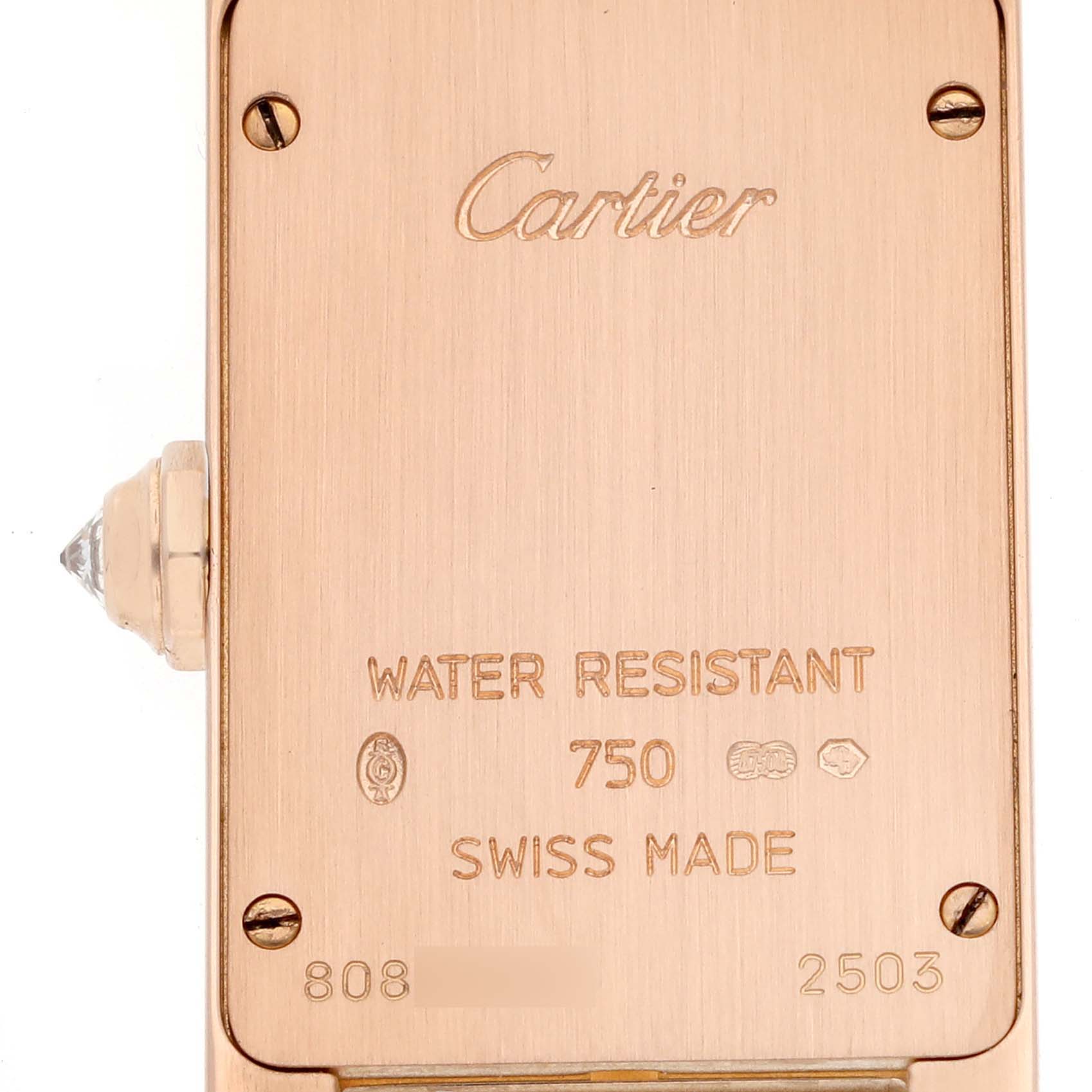 This is a close-up of the back of a Cartier Tank Americaine WB7079M5 Women's Rose Gold Silver Dial WB7079M5 Women's Rose Gold Silver Dial watch, showing the case details and water resistance markings.