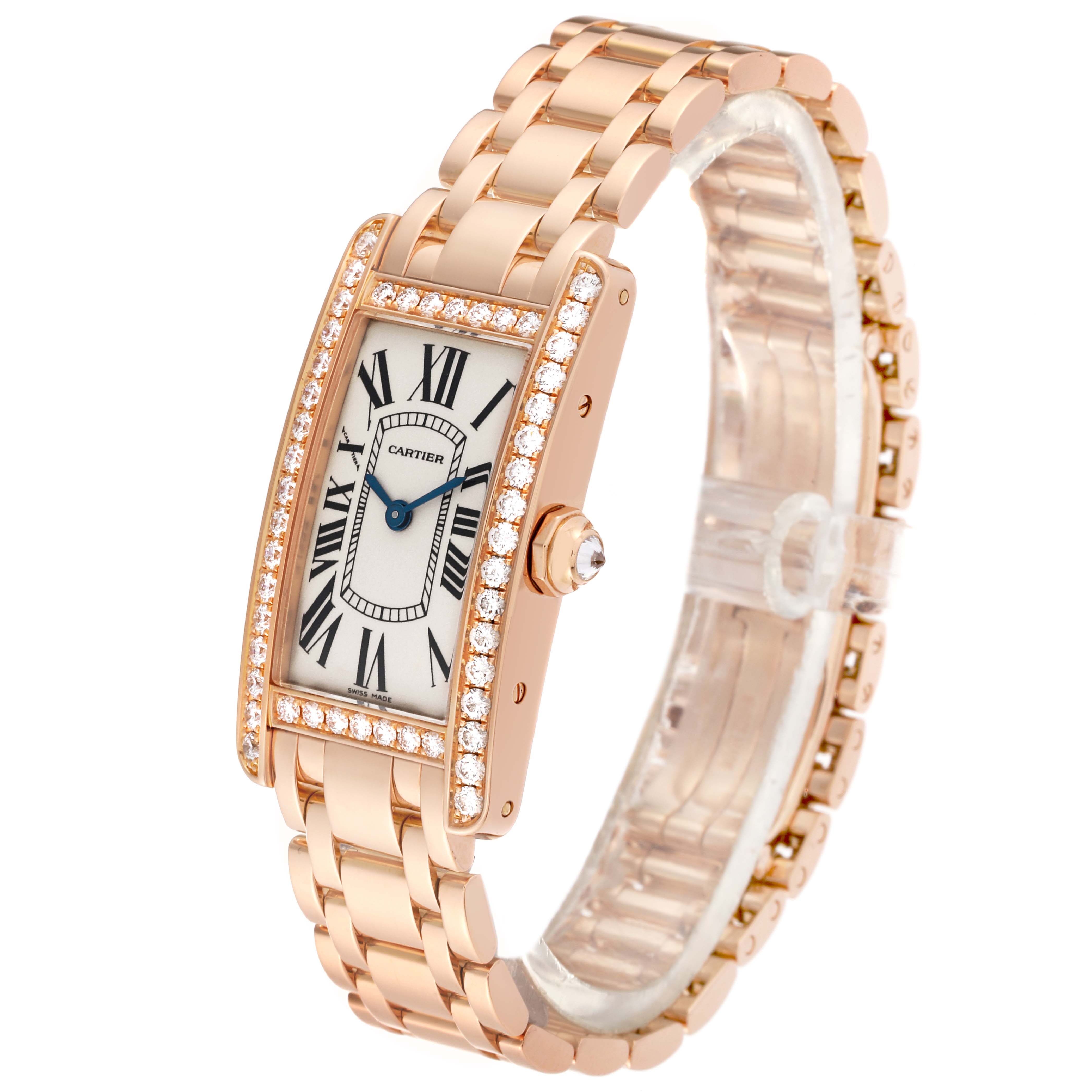 The image shows a Cartier Tank Americaine WB7079M5 Women's Rose Gold Silver Dial WB7079M5 Women's Rose Gold Silver Dial watch at a three-quarter angle, displaying its bracelet, face, and diamond-encrusted bezel.