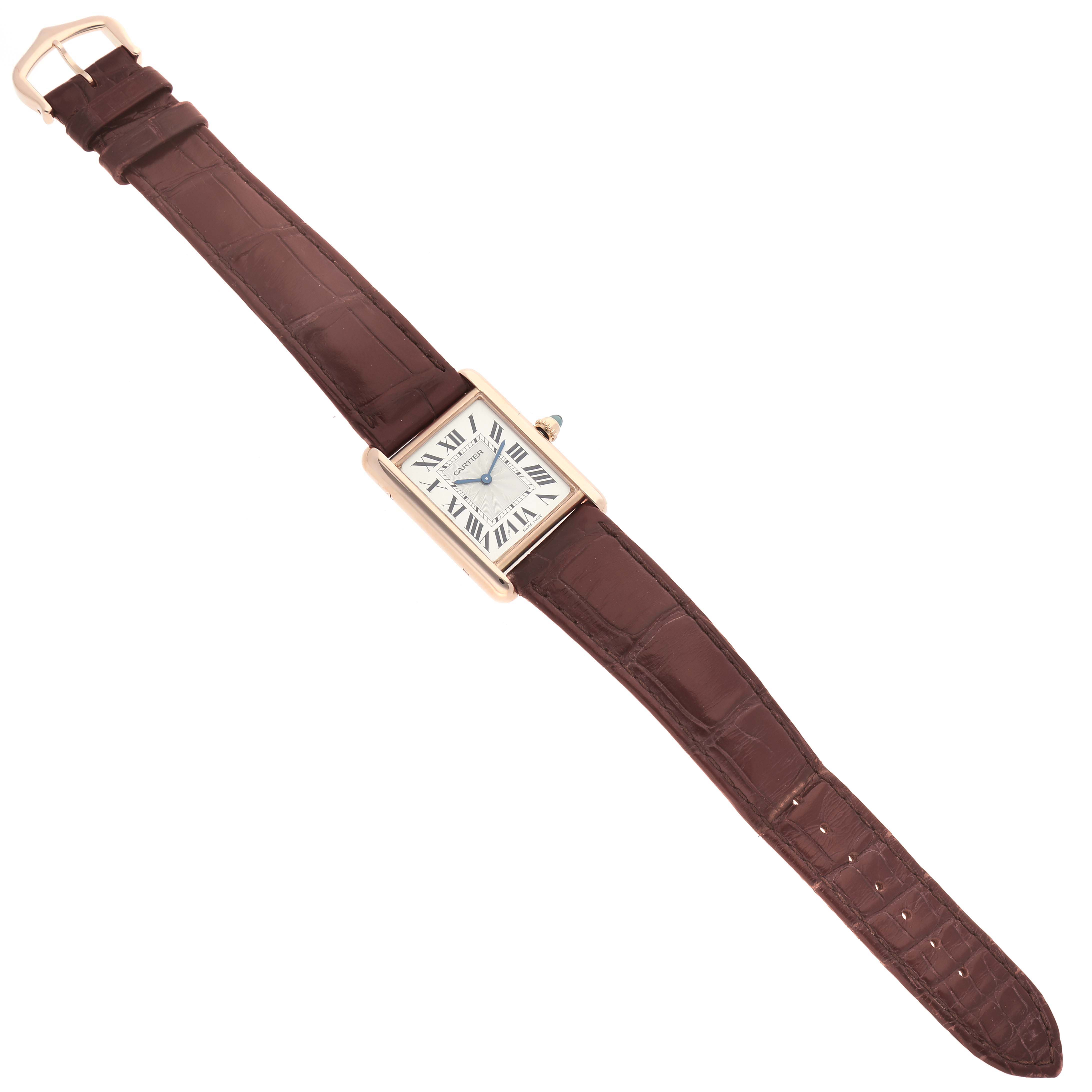 The image shows a full view of the Cartier Tank Louis WGTA0011 Men's Rose Gold Silver Dial WGTA0011 Men's Rose Gold Silver Dial watch laid flat, displaying its rectangular face and brown leather strap.