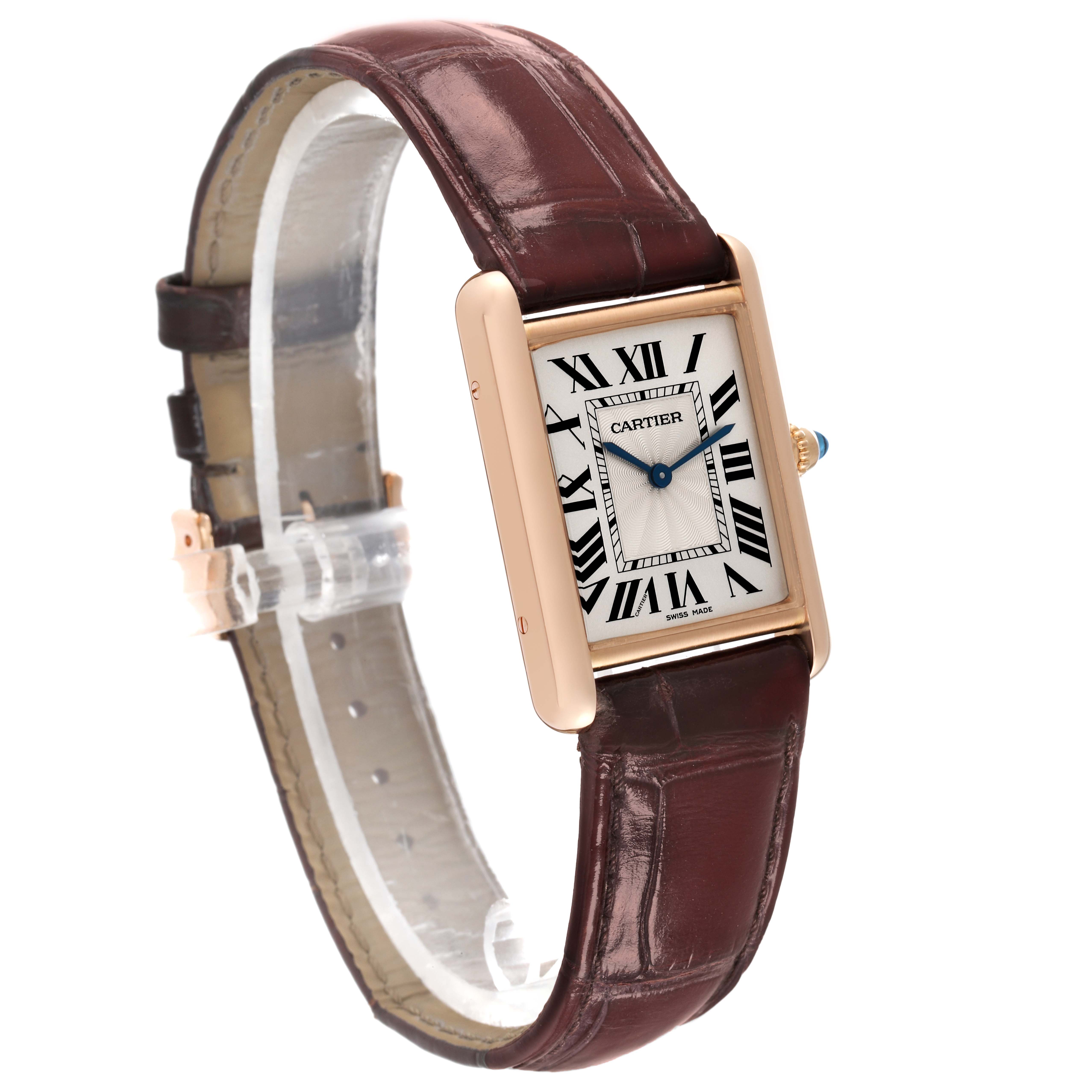 The image shows a Cartier Tank Louis WGTA0011 Men's Rose Gold Silver Dial WGTA0011 Men's Rose Gold Silver Dial watch from a front-left angle, highlighting its rectangular dial and brown leather strap.
