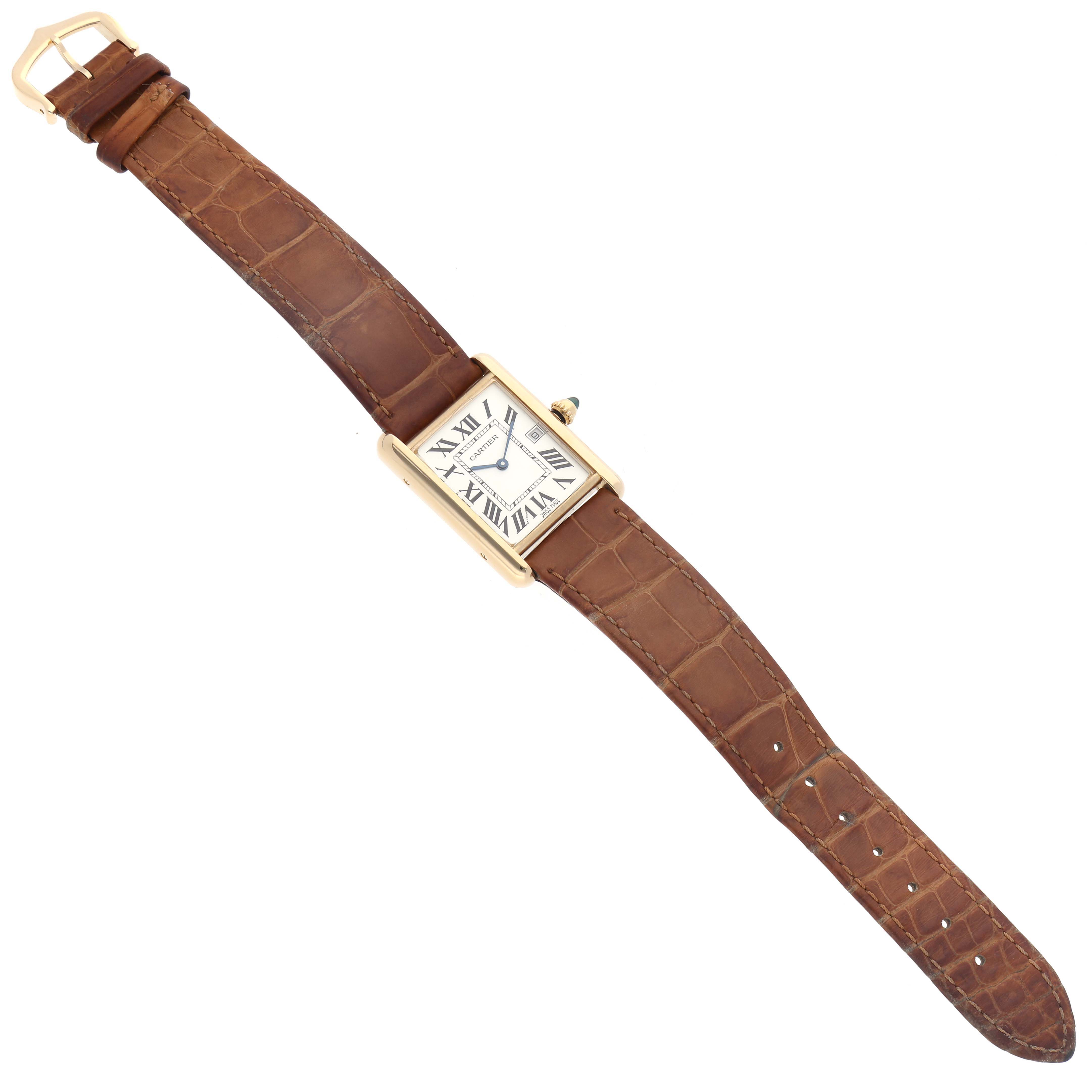 The image shows a top-down view of the Cartier Tank Louis W1529756 Men's Yellow Gold Silver Dial W1529756 Men's Yellow Gold Silver Dial watch, featuring a rectangular face, Roman numerals, and a brown leather strap.
