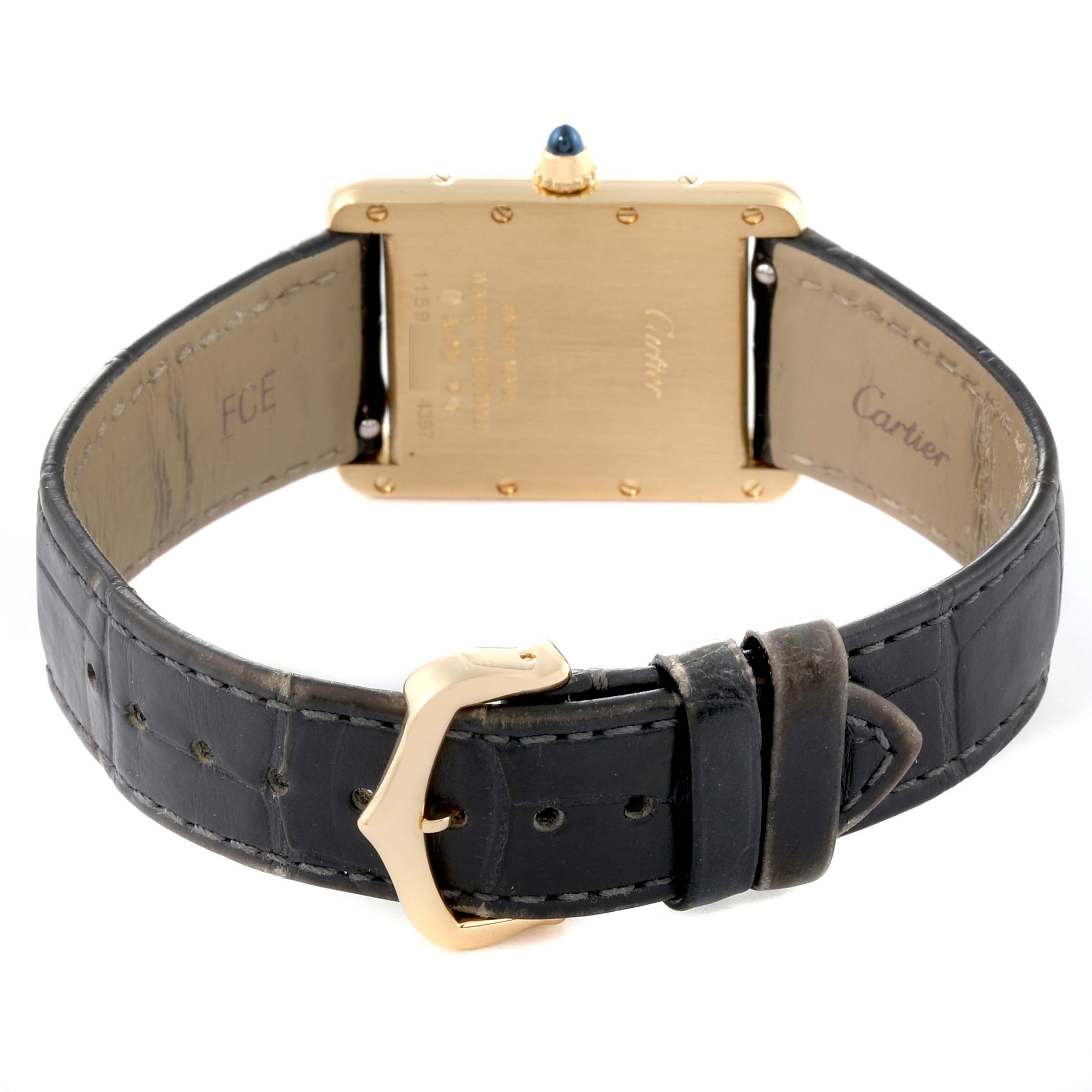 The image shows the back view of a Cartier Tank Louis WGTA0067 Men's Yellow Gold Silver Dial WGTA0067 Men's Yellow Gold Silver Dial watch, highlighting the case, crown, and leather strap with buckle.