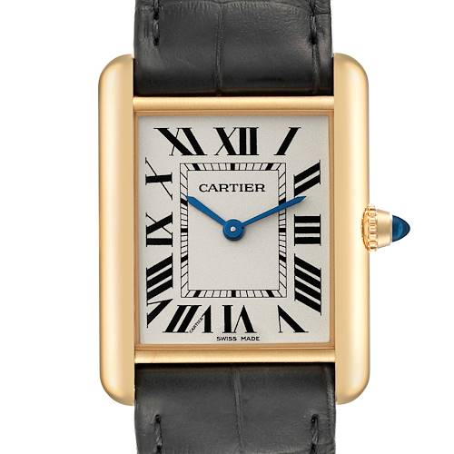 This image shows a close-up of the Cartier Tank Louis watch face, highlighting its Roman numerals and gold rectangular case.