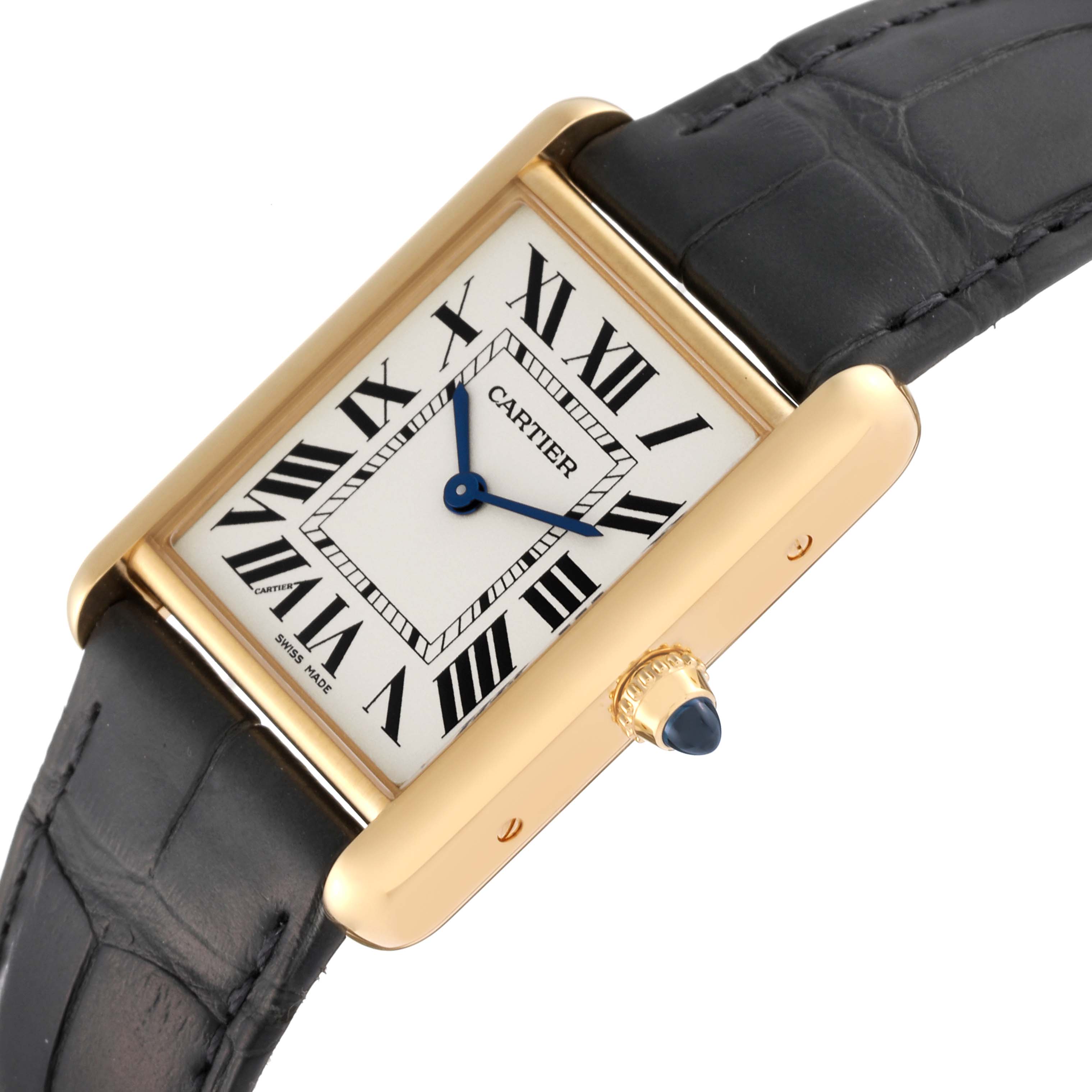 This image shows a Cartier Tank Louis WGTA0067 Men's Yellow Gold Silver Dial WGTA0067 Men's Yellow Gold Silver Dial watch at a tilted angle highlighting the face, crown, and part of the black leather strap.