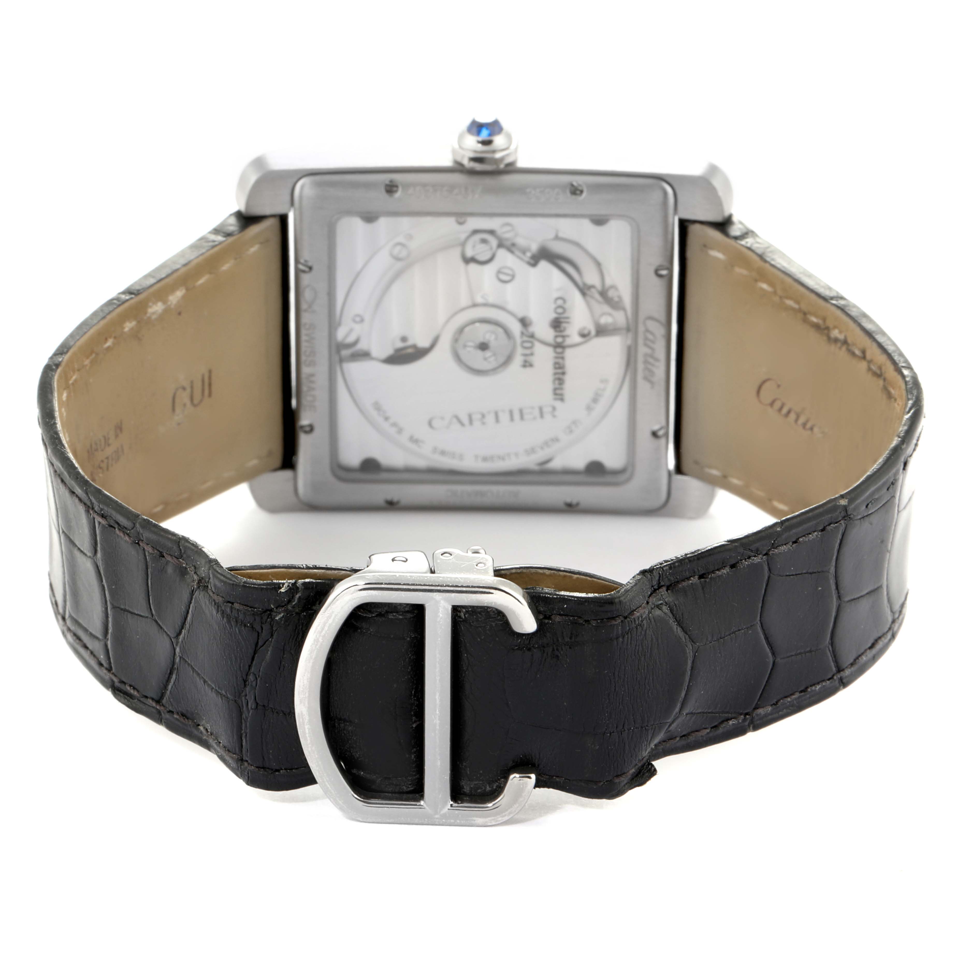 The image shows the back view of the Cartier Tank MC W5330003 Men's Stainless Steel Silver Dial W5330003 Men's Stainless Steel Silver Dial watch, highlighting its movement and leather strap with the buckle.